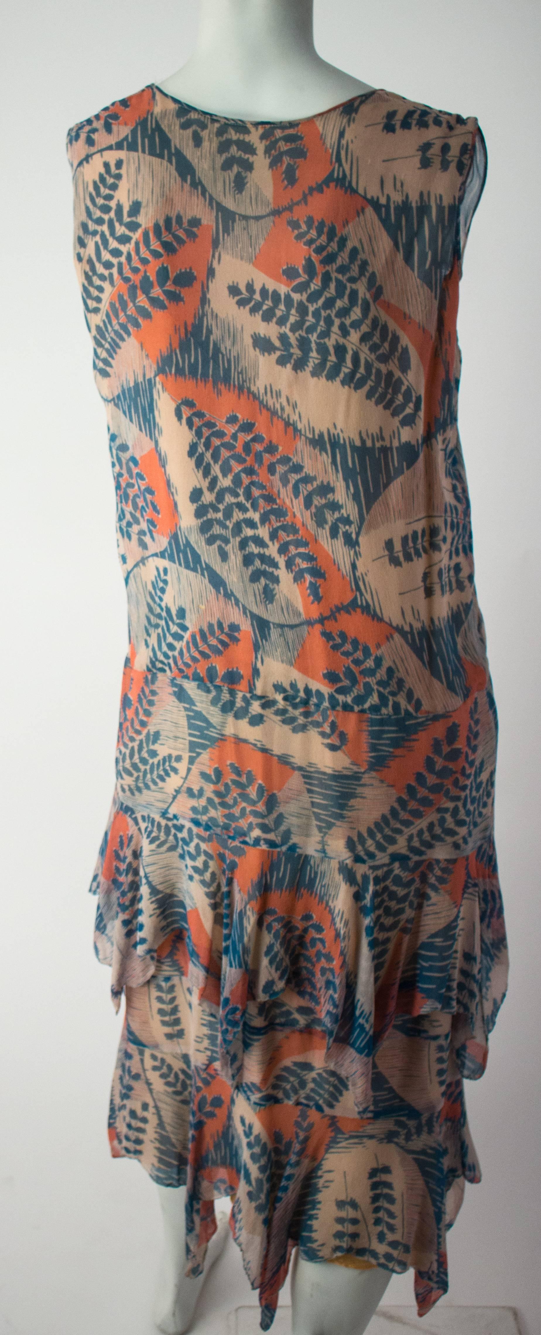 20s Silk Chiffon Fern Print Dress. Handkerchief hem. No closures. Lined in nude chiffon and pink silk.  