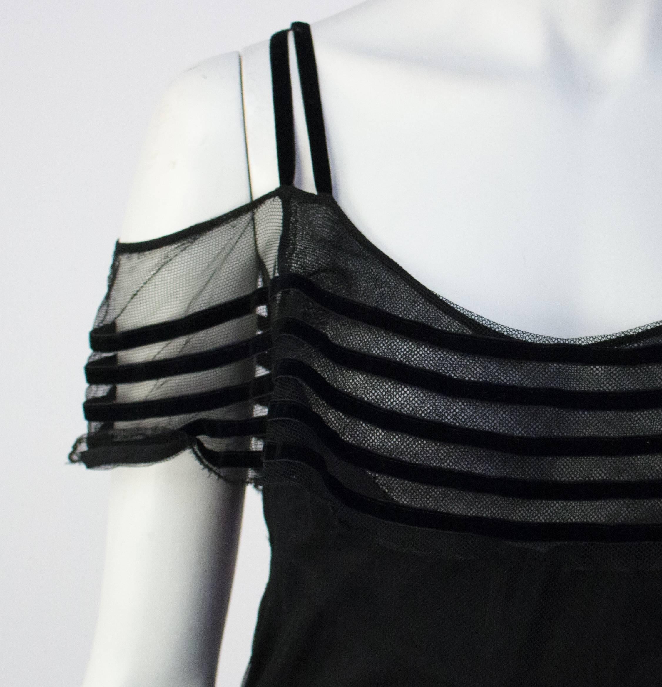 30s Black Mesh Evening Gown w/ Velvet Trim. Built in slip. Velvet belt with rhinestone buckle, small rhinestone buckle back detail. No closures.