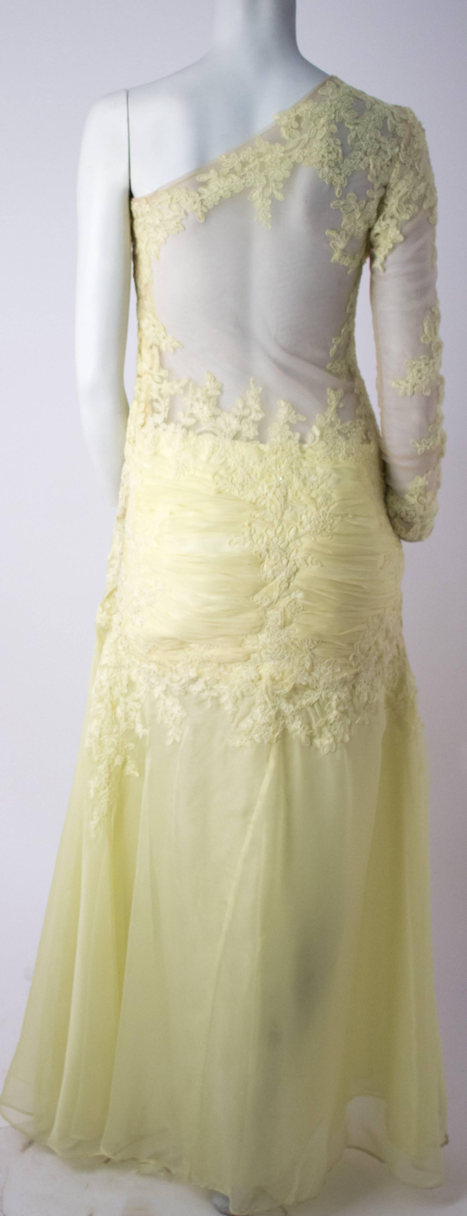 80s Yellow Lace Evening Gown. Lined in nude mesh, lace appliqué on bodice and sleeve.