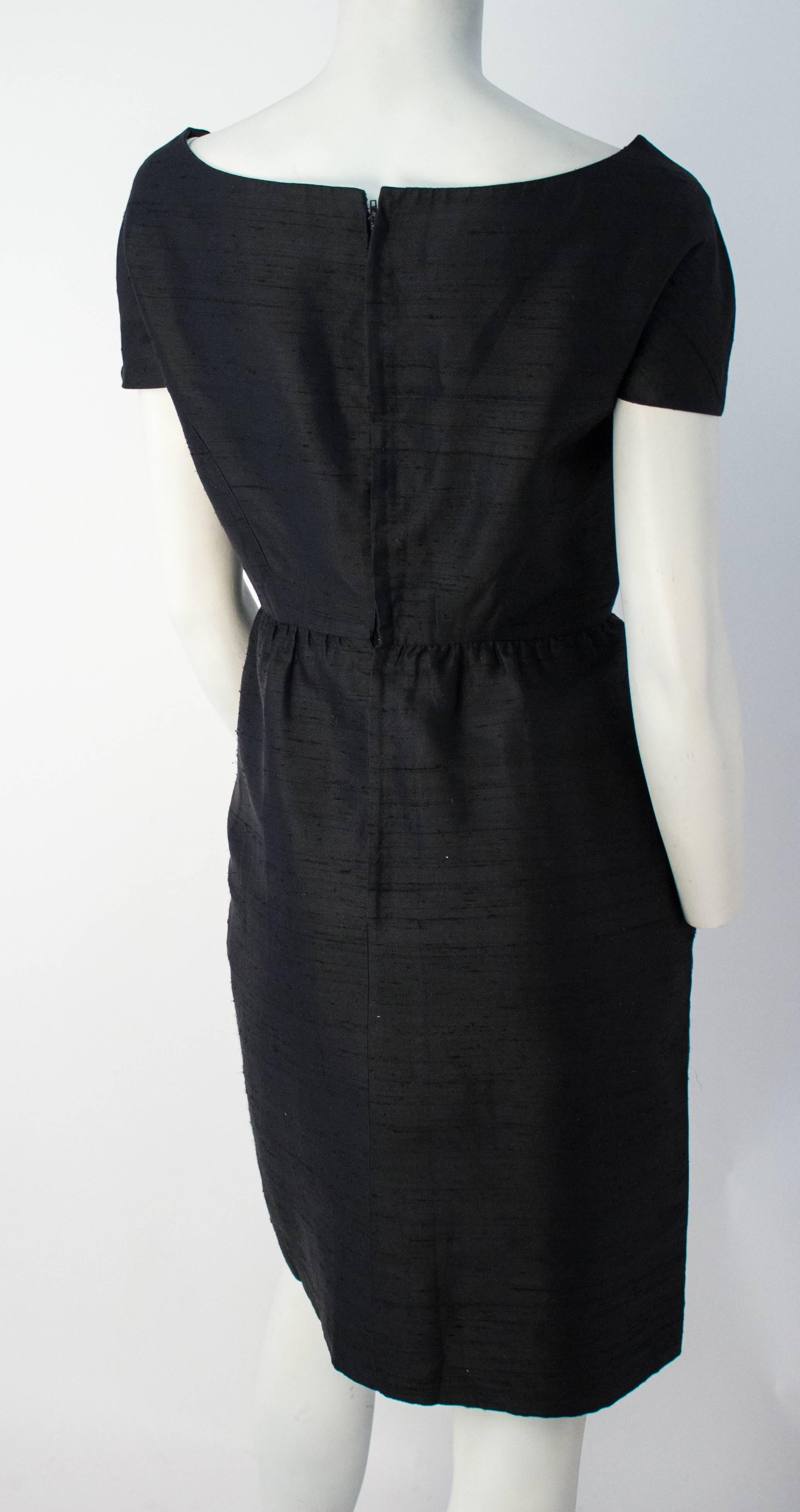 50s Black Silk Shantung Short Sleeve Cocktail Dress. Fully lined.