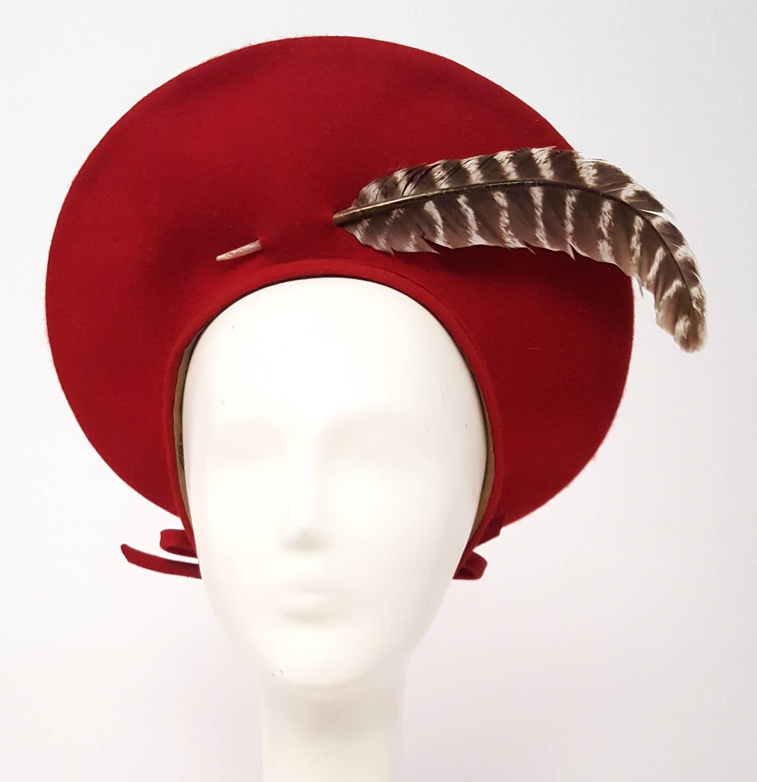 40s Red Felt Beret Hat w/ Feather Detail. Bow detail at back. 

20 1/2" hat band circumference
11 1/2" diameter