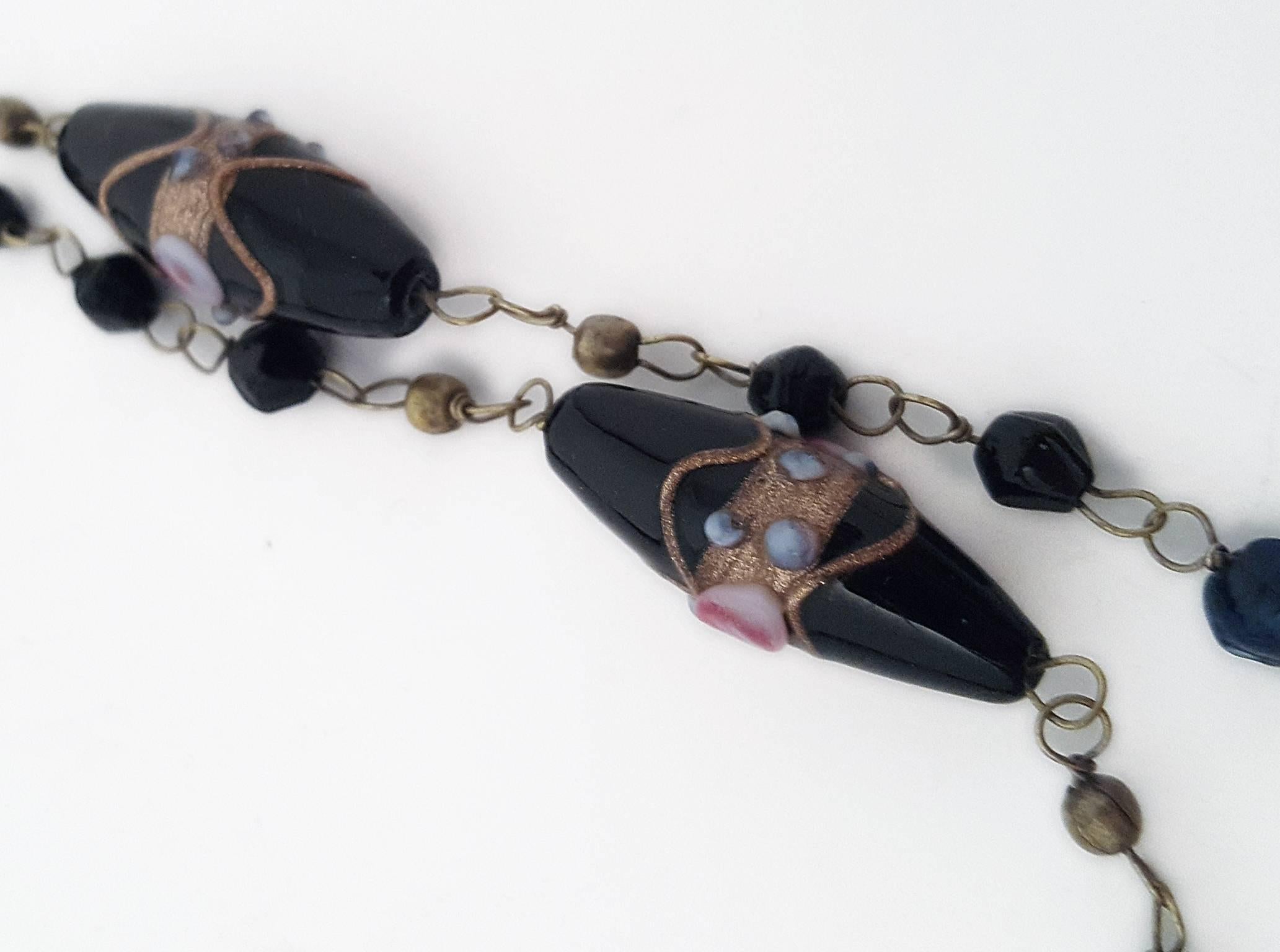 1920s Handmade Venetian Glass Beaded Necklace. 

36" circumference
1/4" wide glass beads