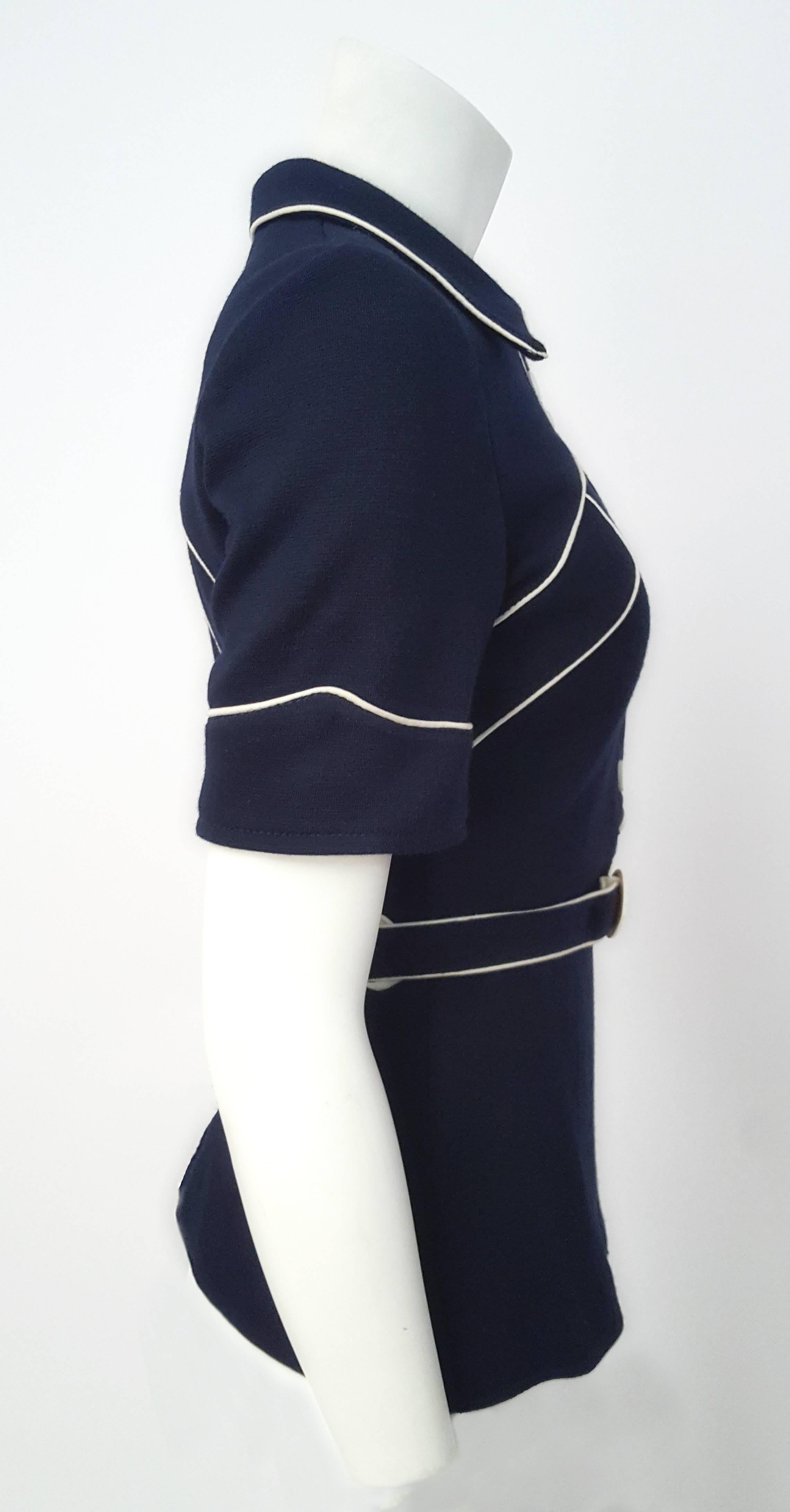 60s Navy Blue Knit Top w/ White Piping. Front button closure. Original belt. Slight fading at lining shown in photo. 