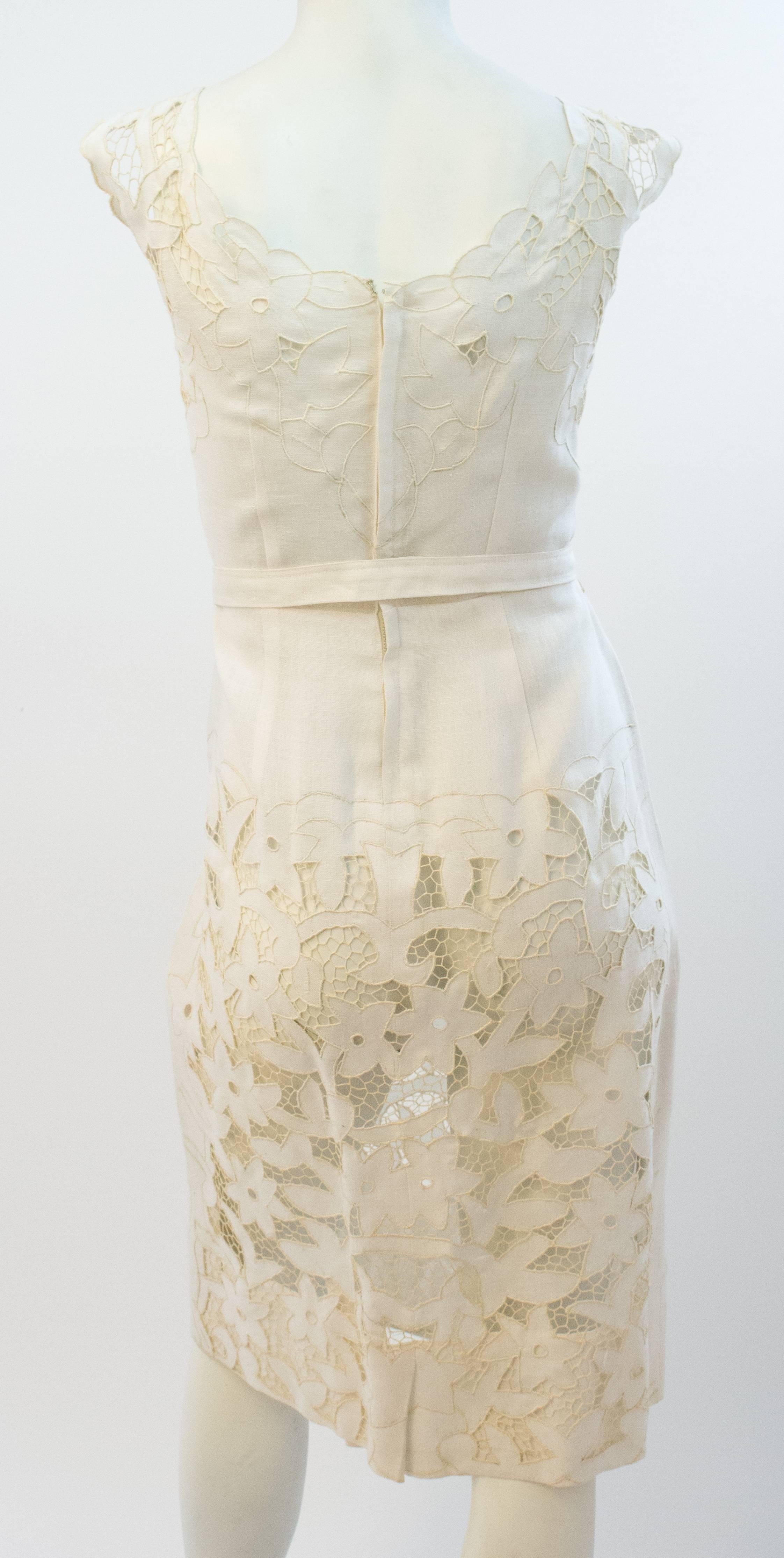 50s White Linen and Lace Dress. Lace is hand done Irish crochet and cutwork. Original belt. One panel of lace lining in front bodice, the rest of the dress is unlined. Back metal zipper closure. 