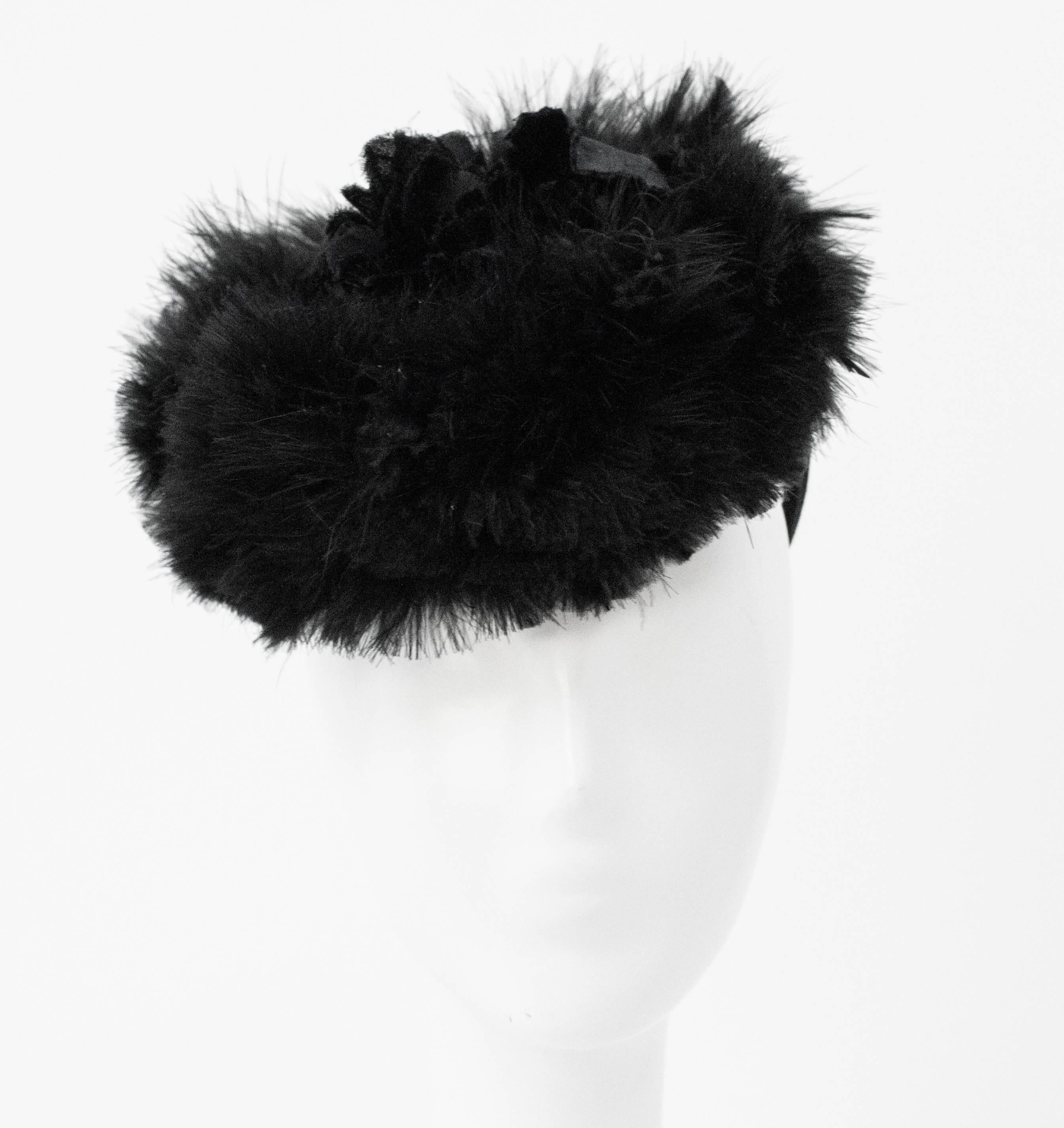 40s Black Feather & Velvet Hat. One size fits most. Slight wear on underside of hat.