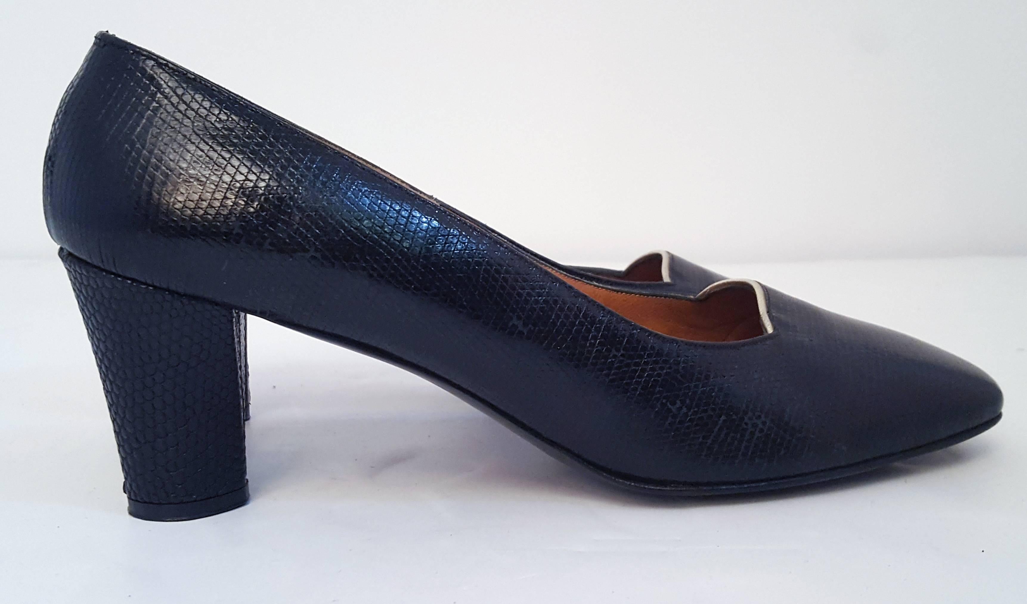 60s Black Pressed Leather Low Heel. Silver piping detail. Marked US size 8. 
