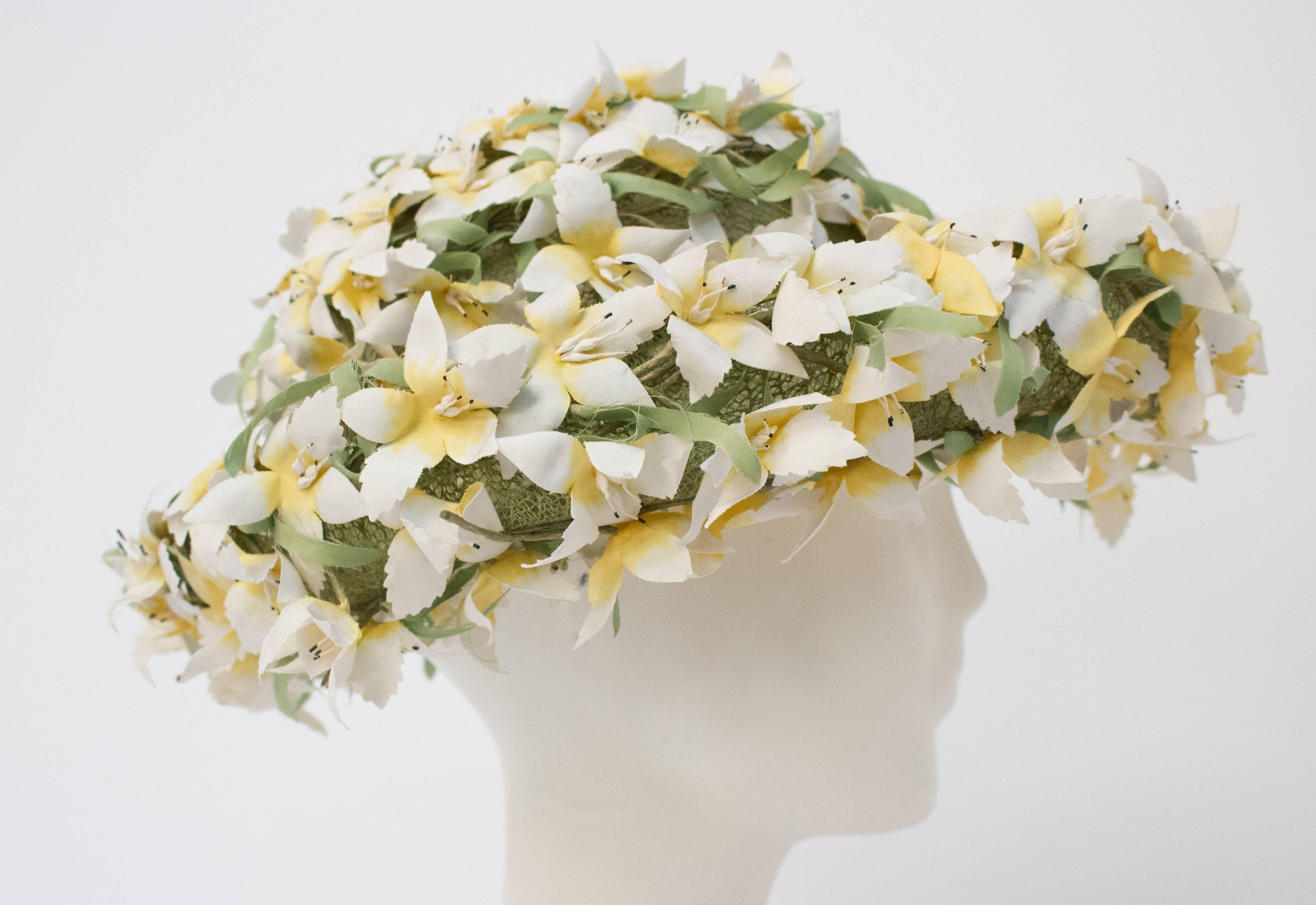 60s Yellow Floral Hat. Hand painted fabric flowers set on a green net base. 