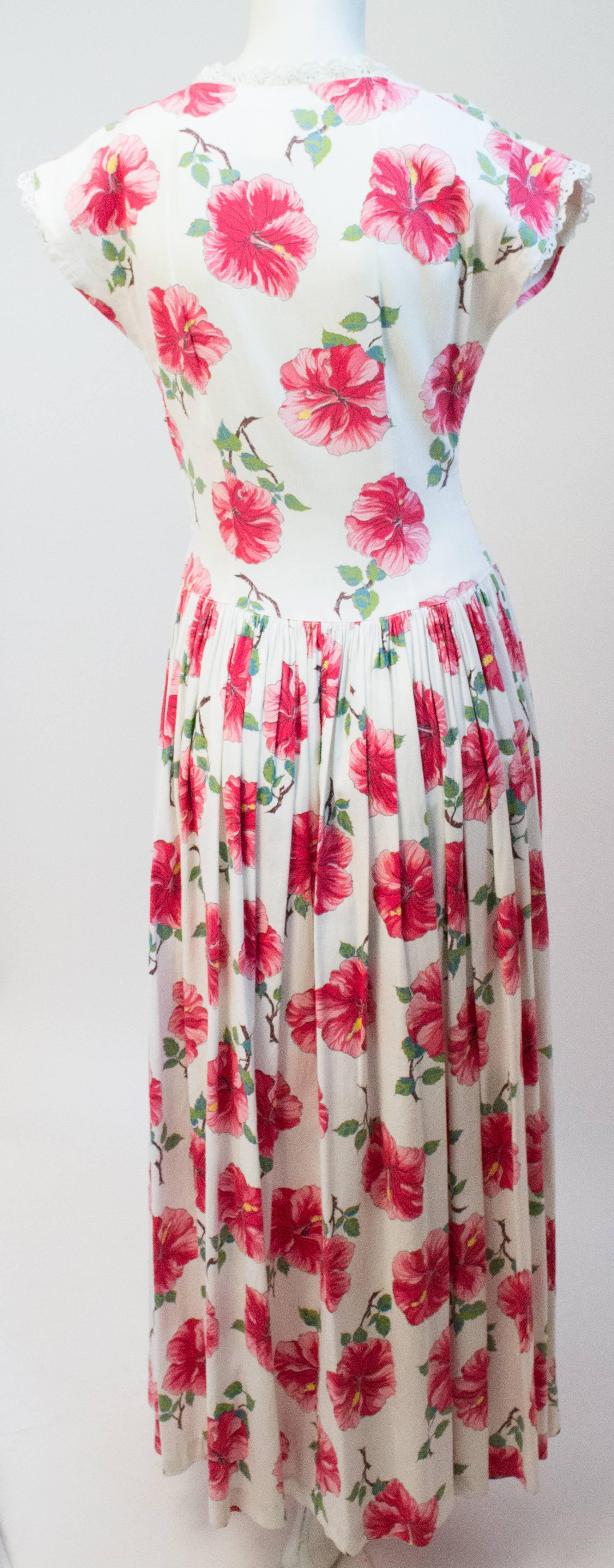40s Floral Printed Day Dress. Printed grosgrain fabric. Front snap closure and metal side zip.