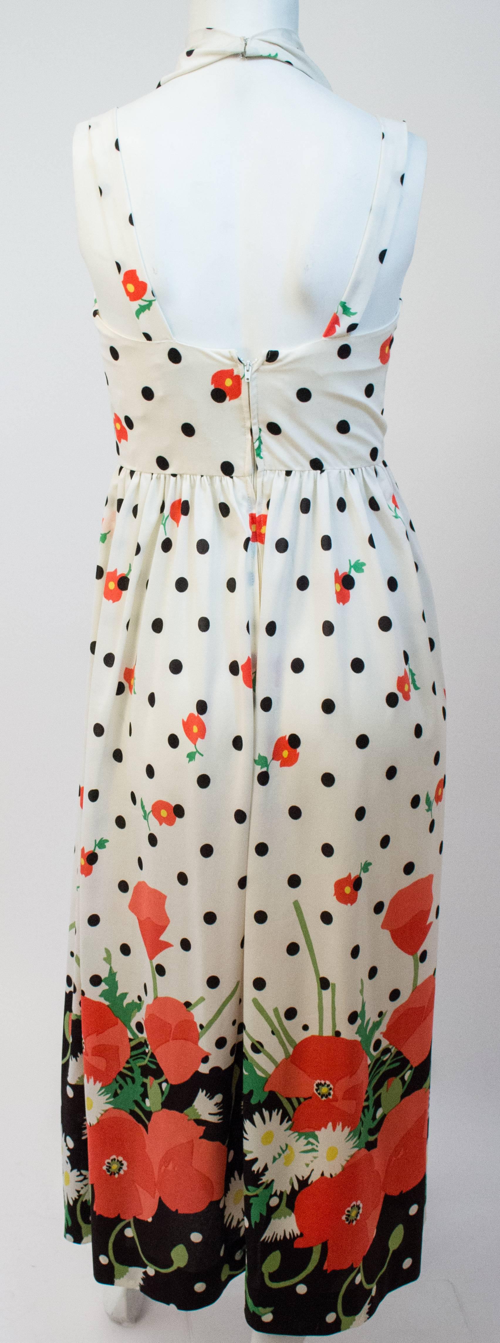 80s Oscar de la Renta Printed Halter Dress. Back zip closure. Halter closed via hook and eyes. 