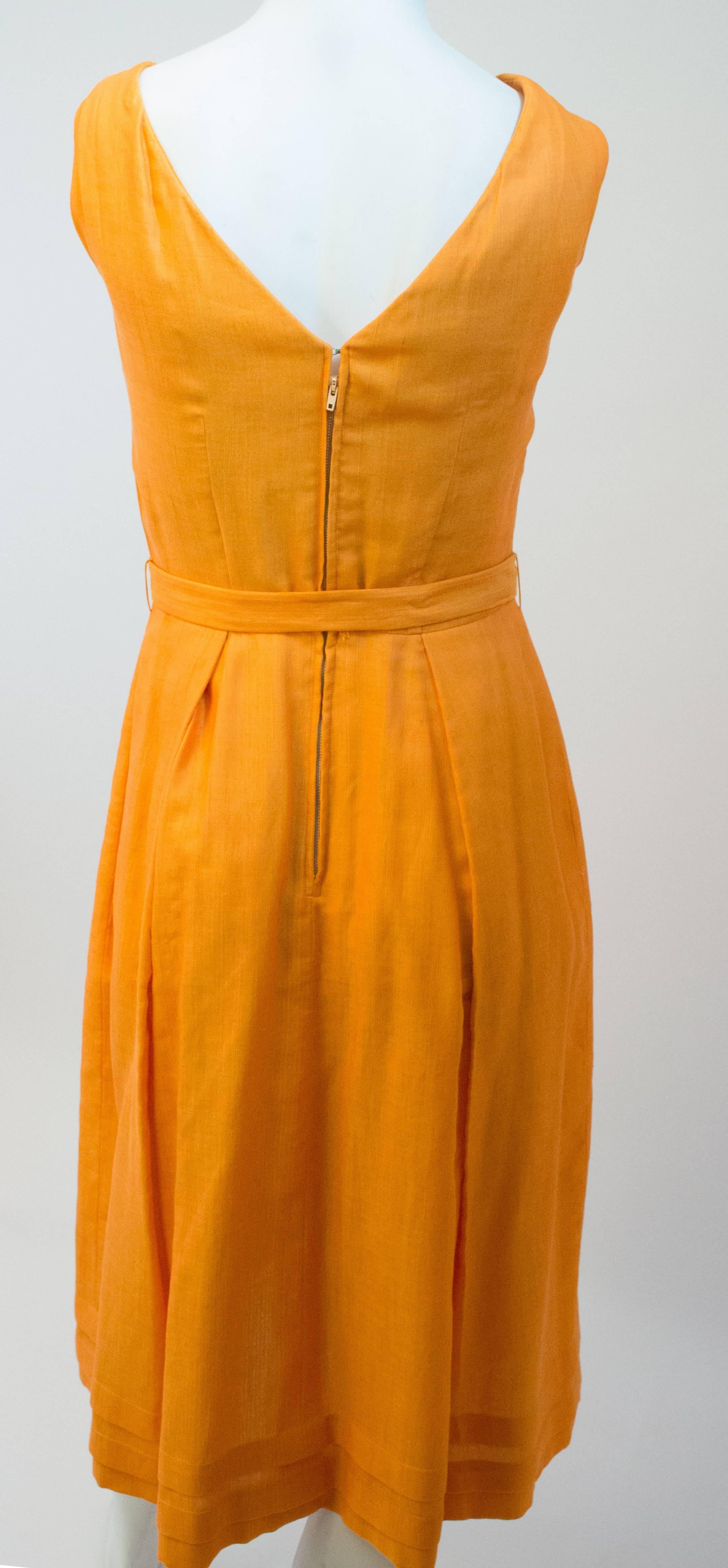 50s Two-Tone Orange Day Dress. Metal back zip. Original belt included. Lined skirt, faced skirt. 