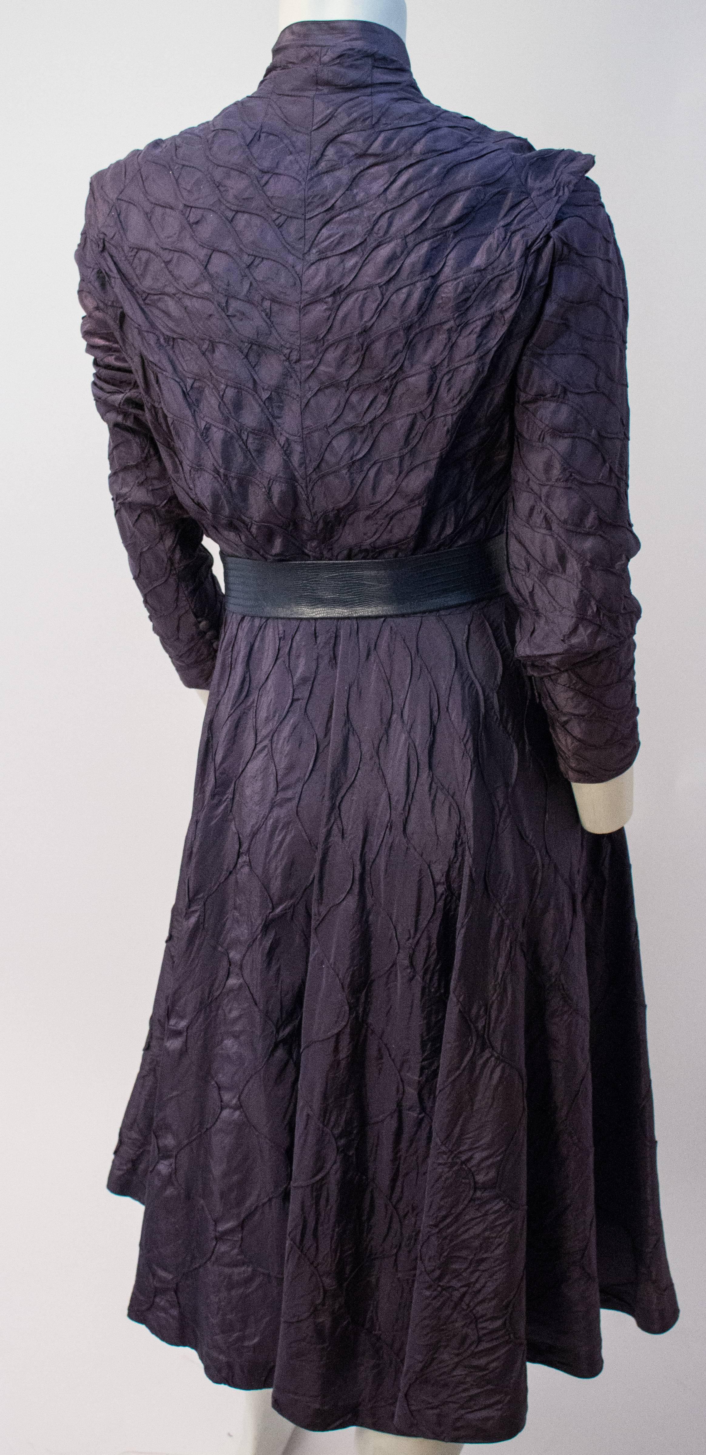 50s Aubergine Smocked Dress. Front button and metal side zip closures. Belt included, unoriginal. 