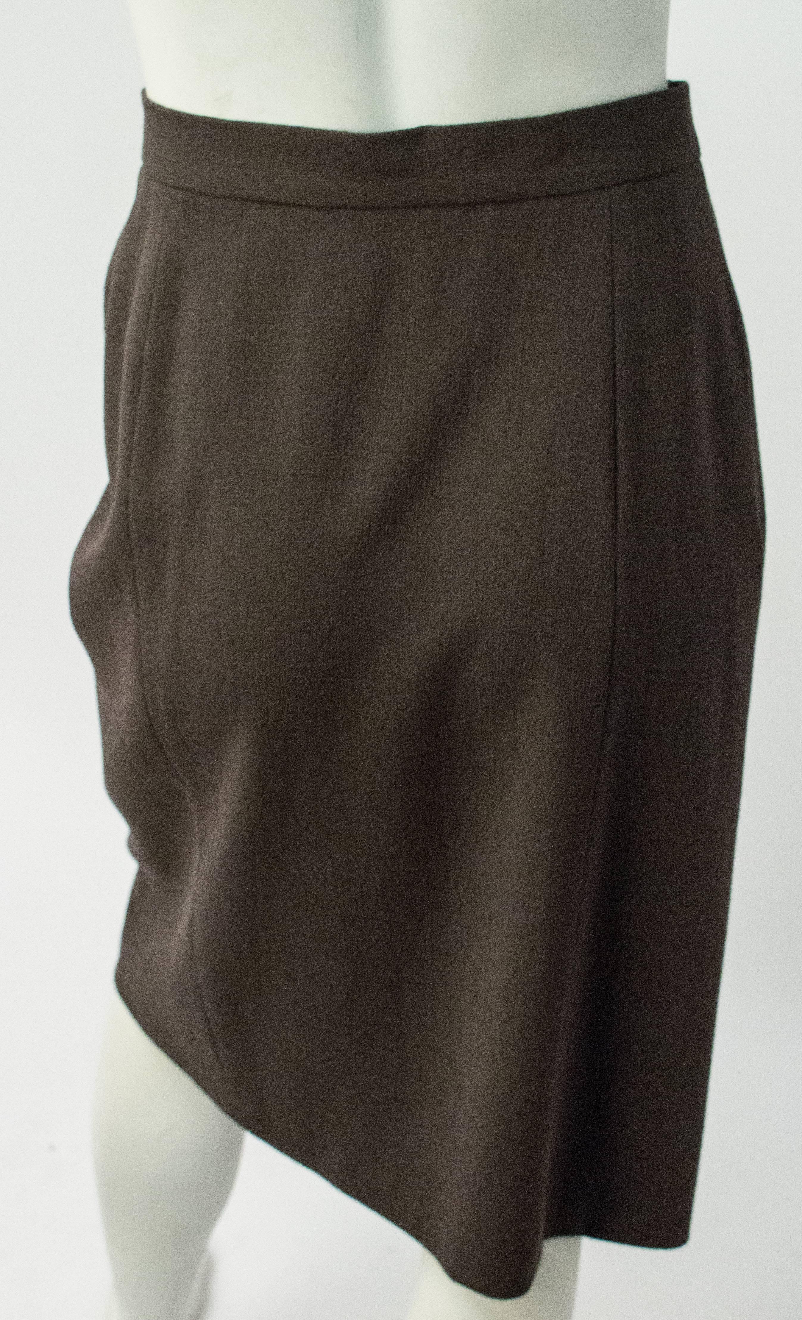 80s Wool Crepe Draped Skirt. Wraparound closure, fastens w/ buttons and velcro. Fully lined. 100% wool, made in Italy.