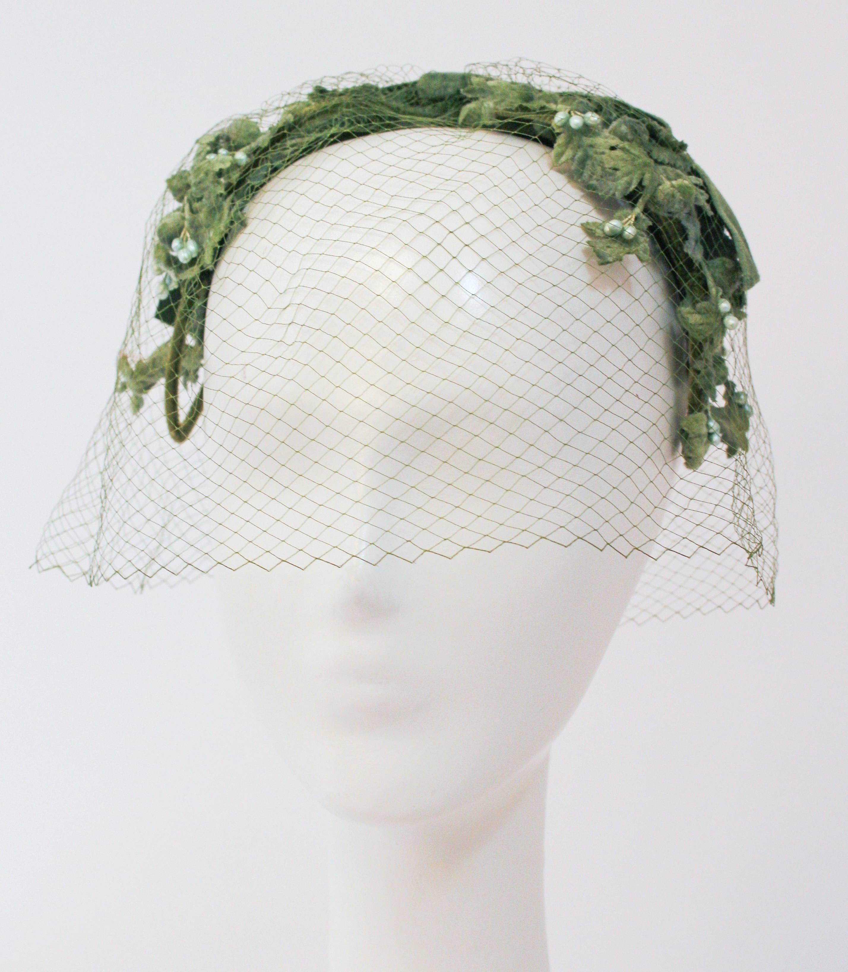 50s Green Floral Hat w/ Veil. Velvet bow and flower detail.