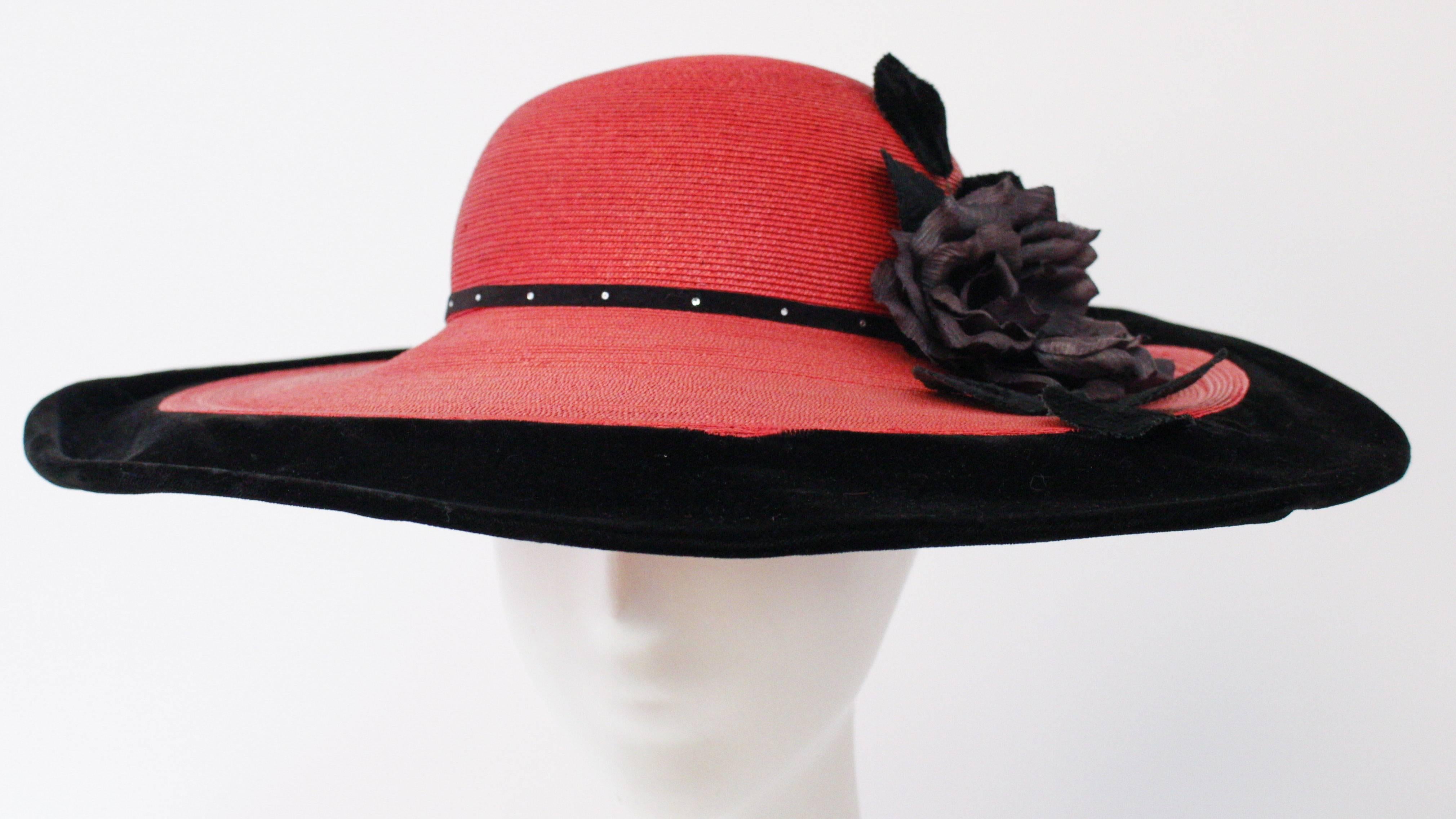 190s Red Wide Brim Hat w/ Velvet Detail. Rhinestoned band and black flower adornment. 