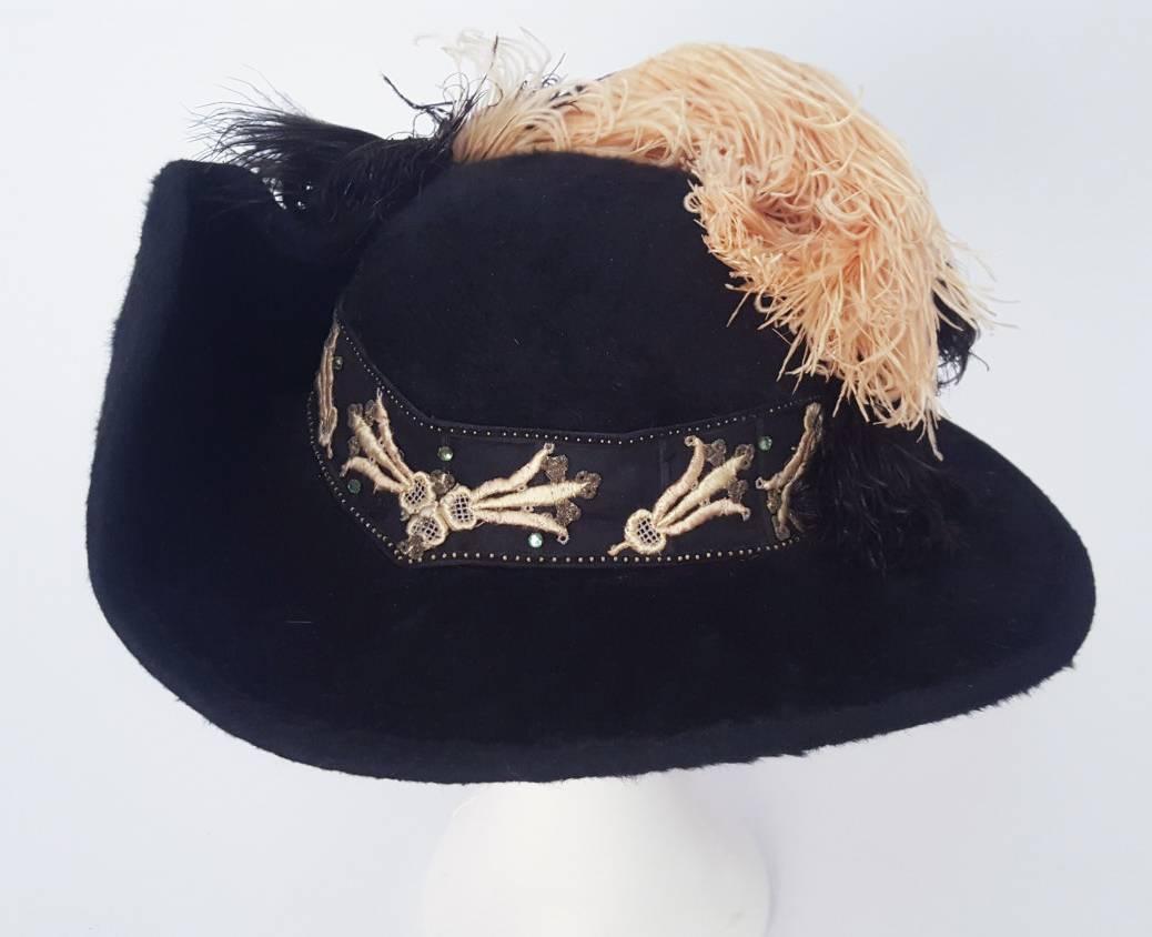 Authentic Edwardian black felt picture hat, trimmed in black and pink ostrich feathers and embroidered ribbon.
