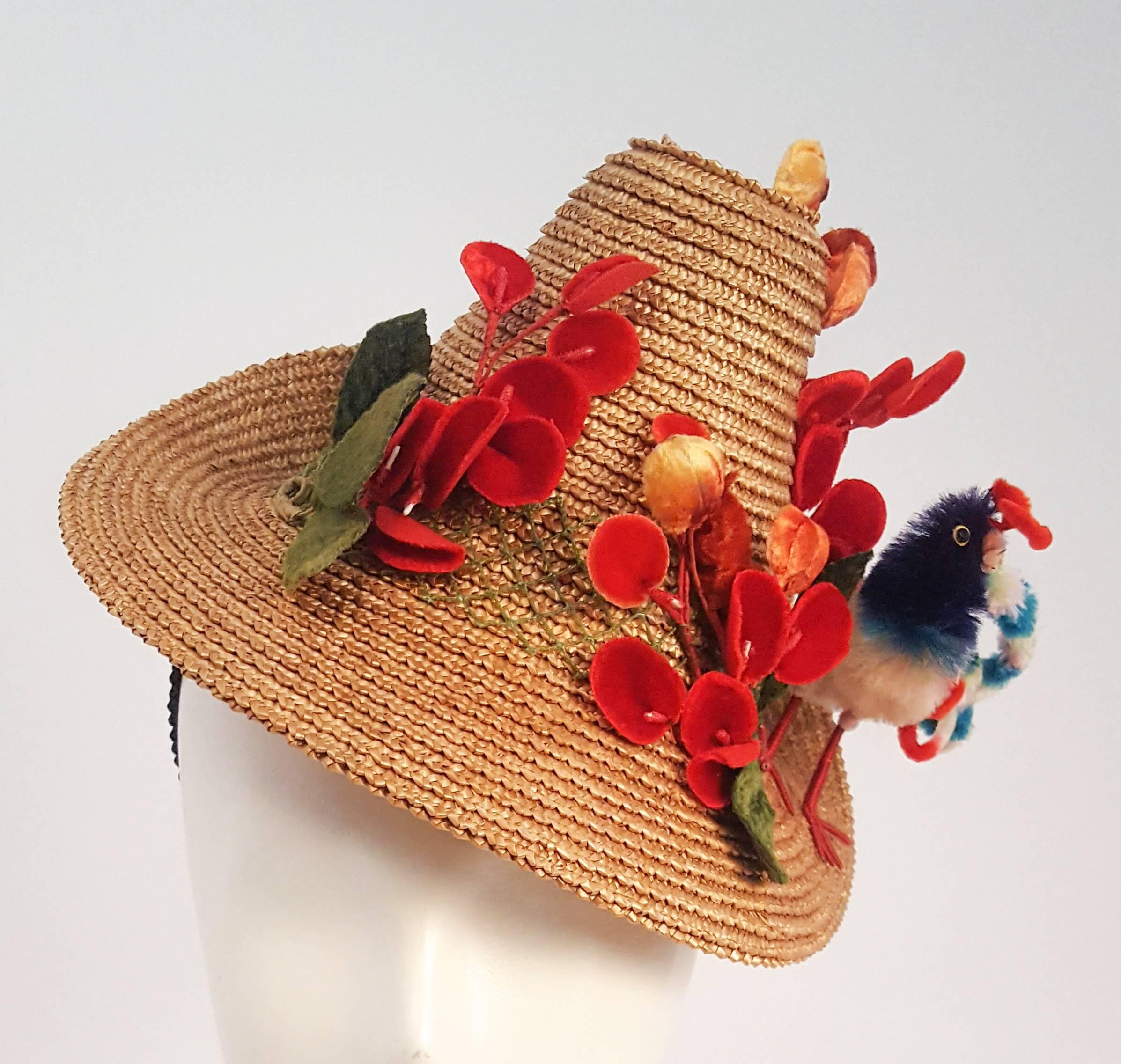 1940s Straw Hat w/ Bird and Flower Embellishment. Elastic band holds hat in place. 
