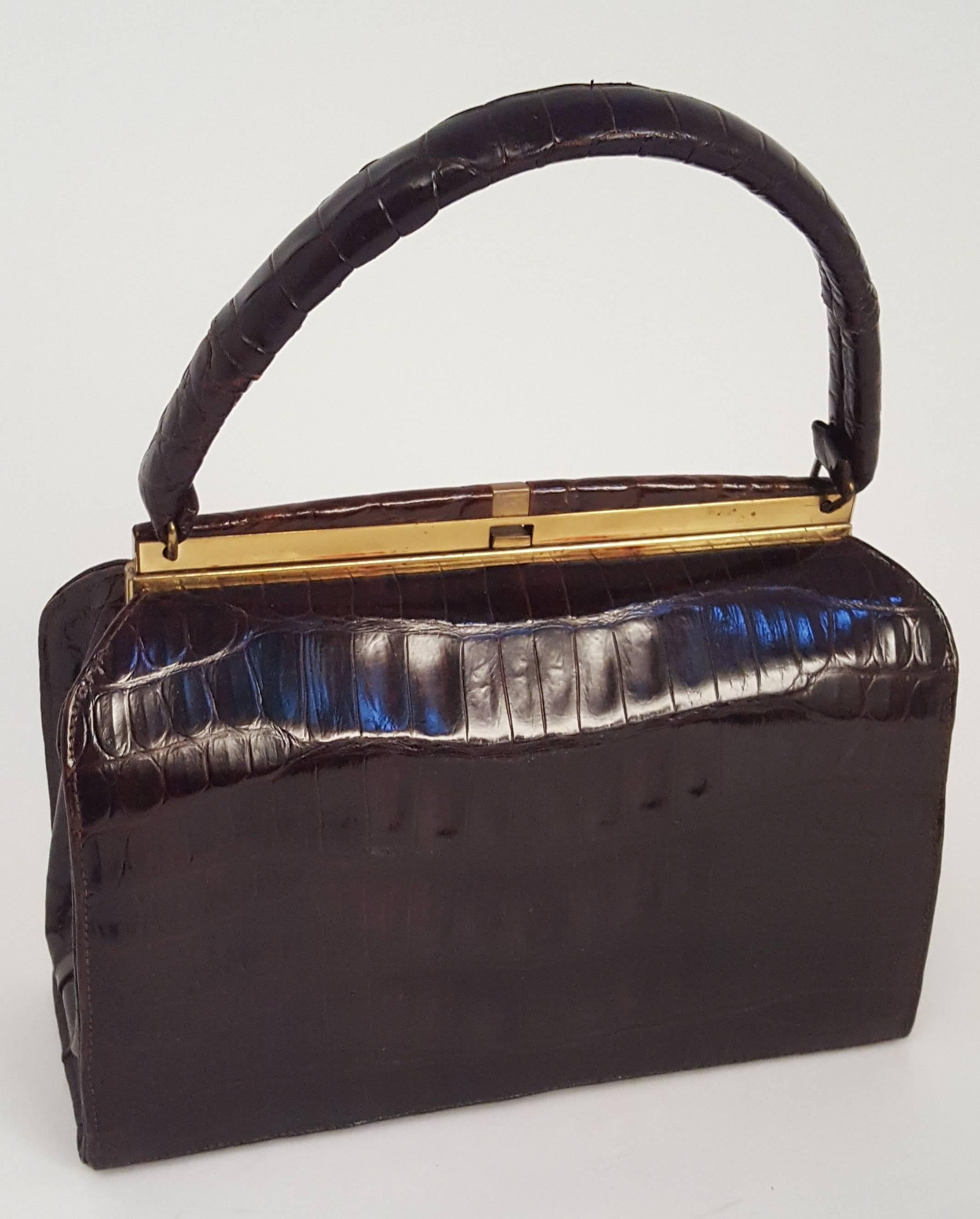 1940s Espresso Alligator Purse. Leather lining. Metal feet on bottom. 