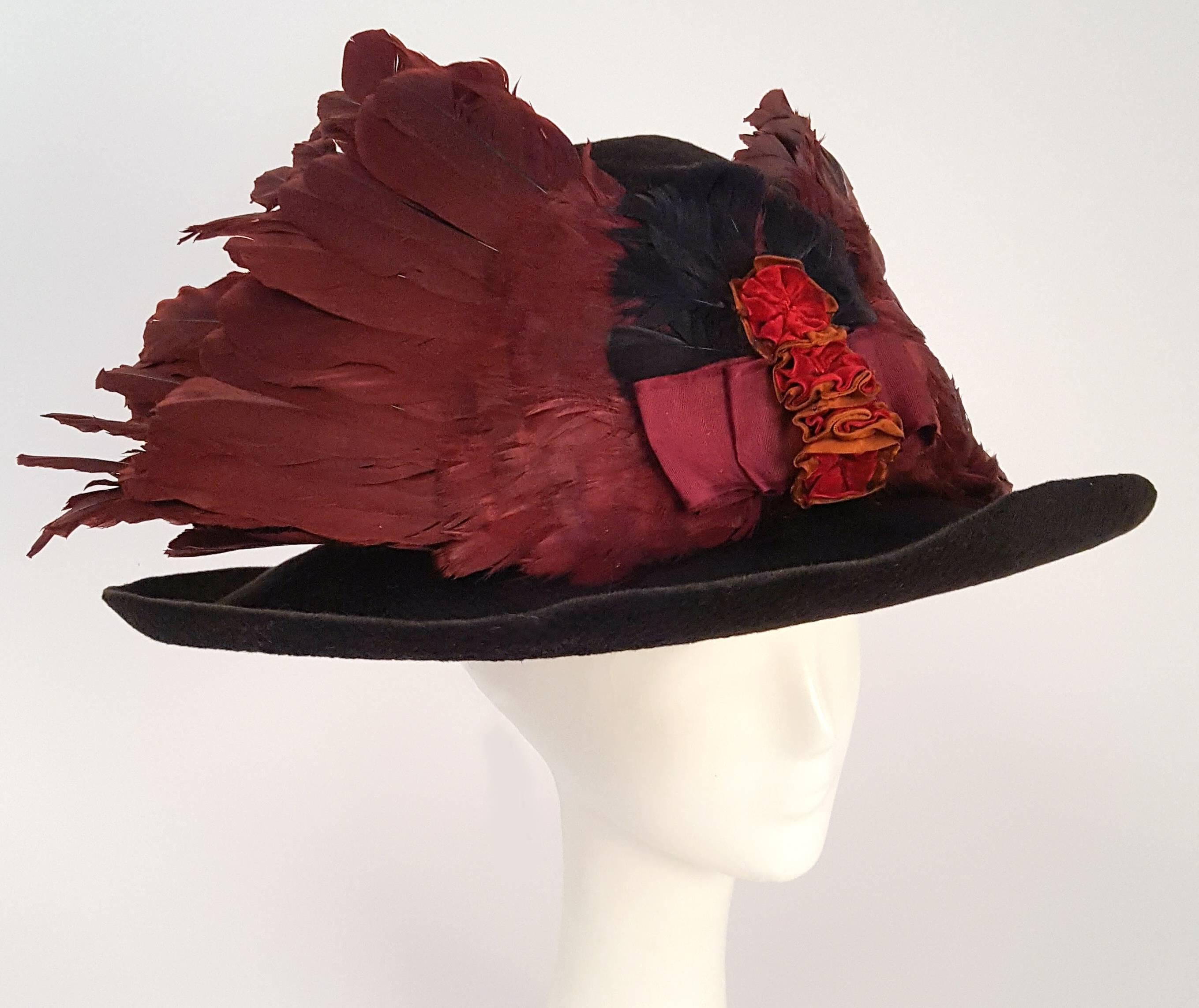 Edwardian Winged Picture Hat. Fully feathered 1910s wide brimmed picture hat with ruffle band detail. Adjustable inner hat band.
