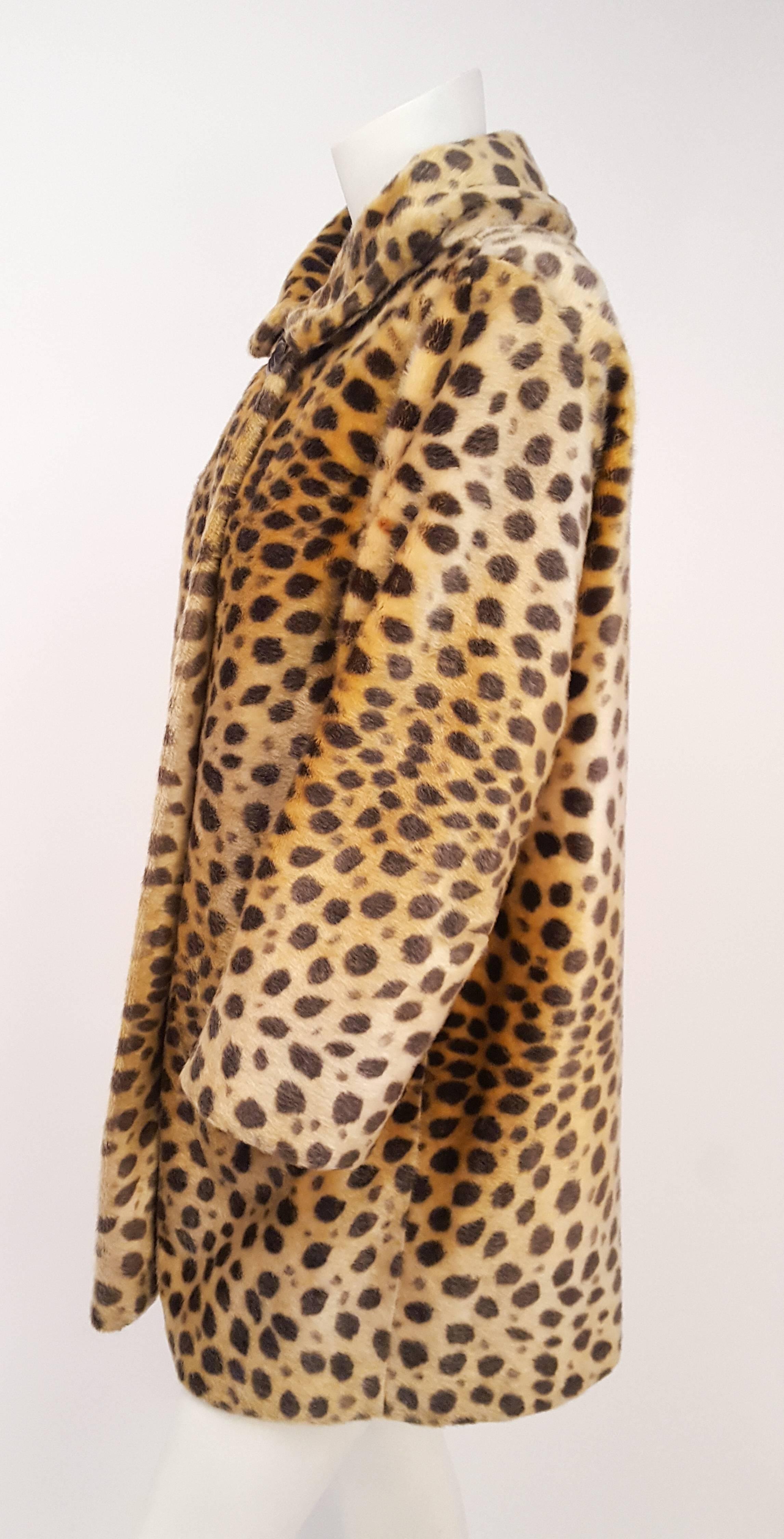 1960s Russel Taylor Leopard Print Coat. Front button closure. Fully lined. Side pockets. Approx size 6.