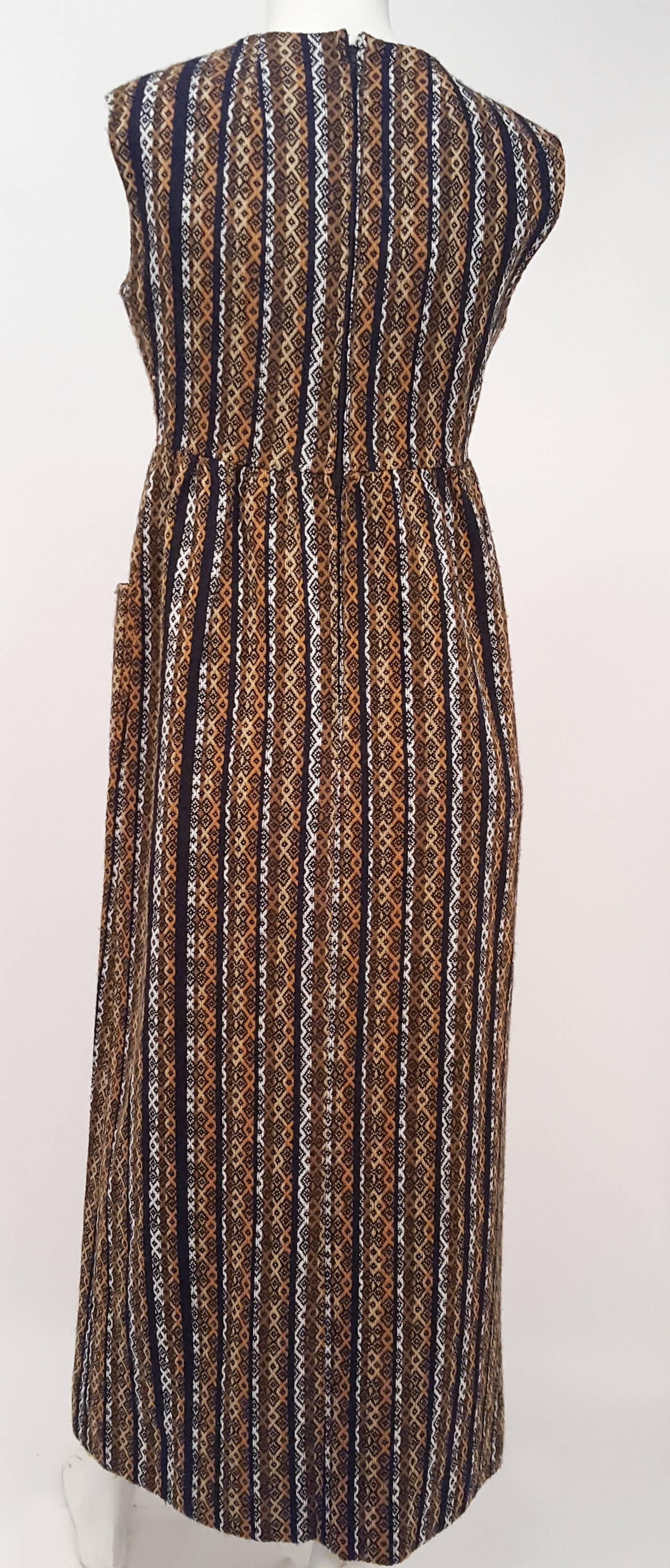 1960s I. Magnin Wool Maxi Dress. Front pockets. Unlined. Back zipper closure. 