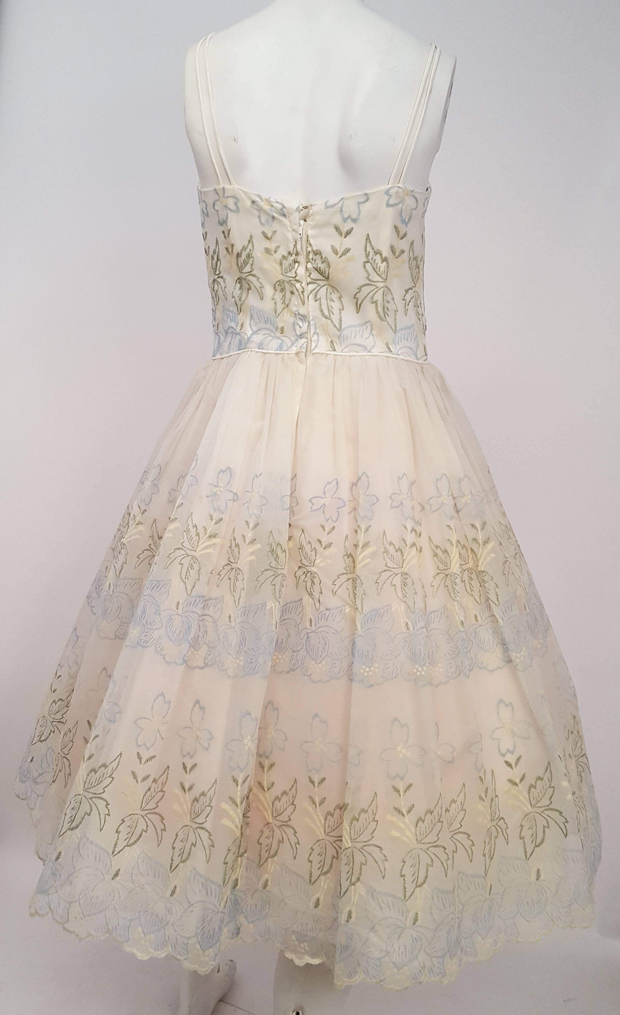 50s Embroidered Organza Party Dress. Blue embroidered flower motif. Layers of tulle and lining for support; however, please note the dress is shot with petticoat for additional fluff. 