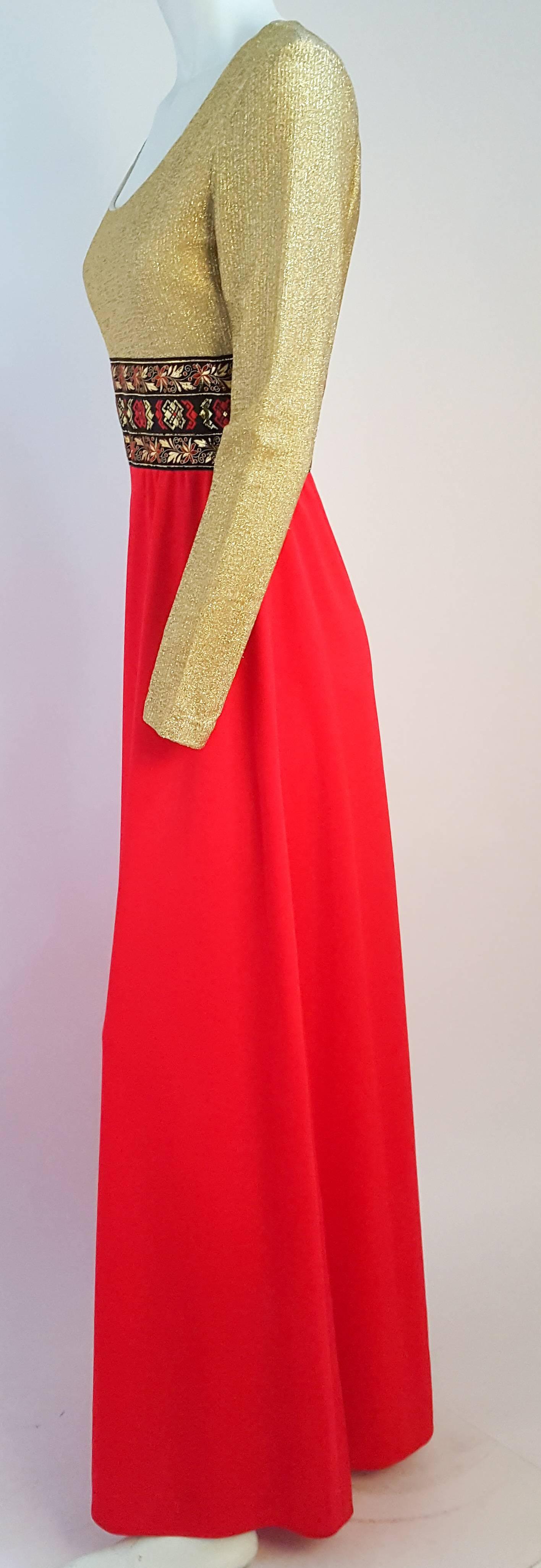 70s Gold and Red Lamé Maxi Dress. Gold metallic bodice w/ embroidered ribbon waist detail, red jersey skirt. Deadstock, unworn w/ tags.