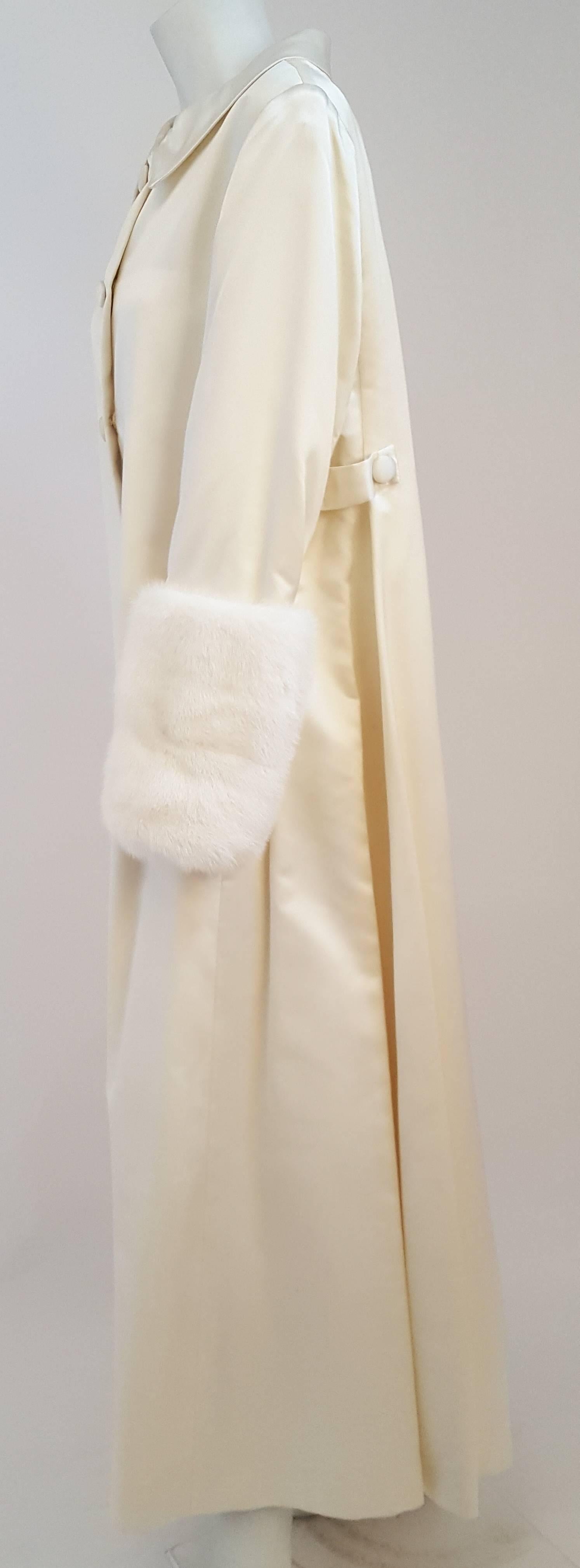 white 60s coat
