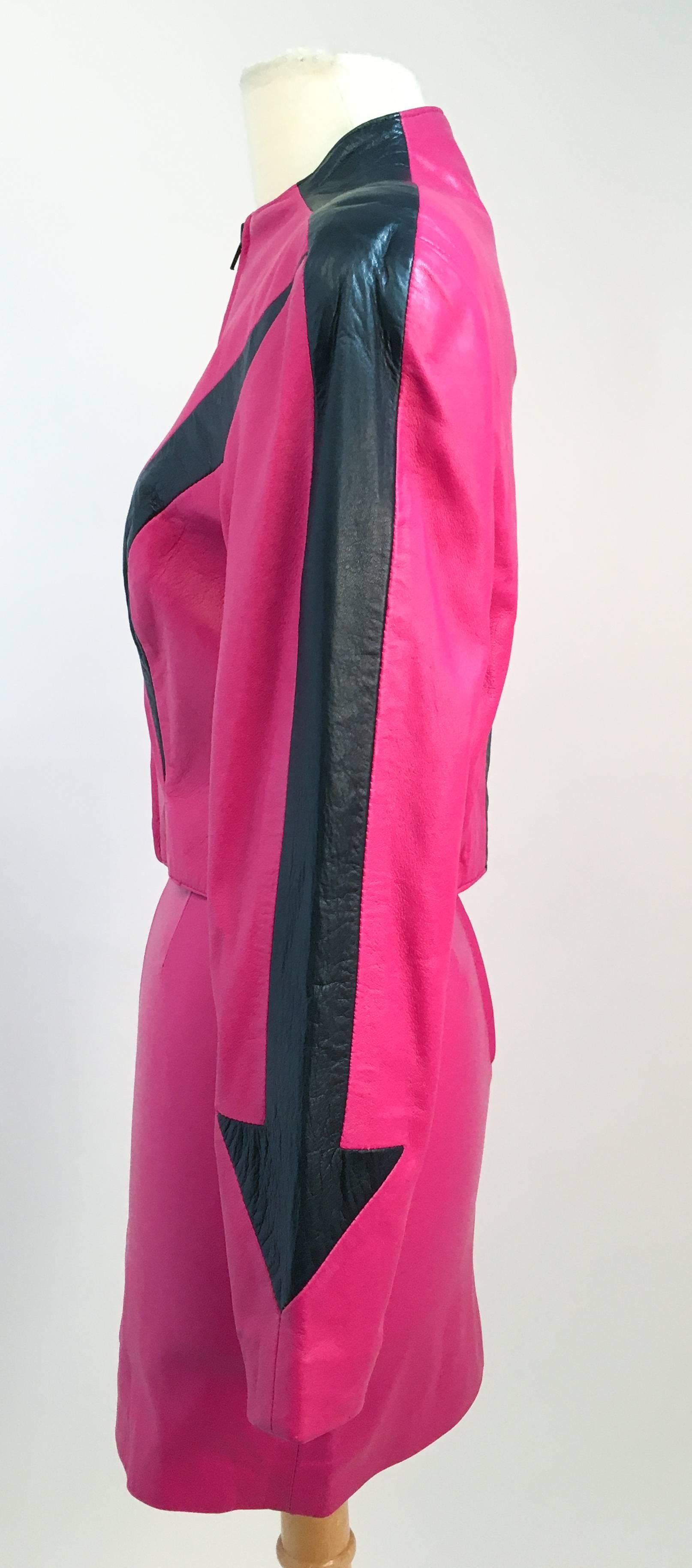 80s Michael Hoban North Beach Leather Hot Pink Jacket and Mini Skirt Set. Collarless jacket with black and pink contact arrow motif. 