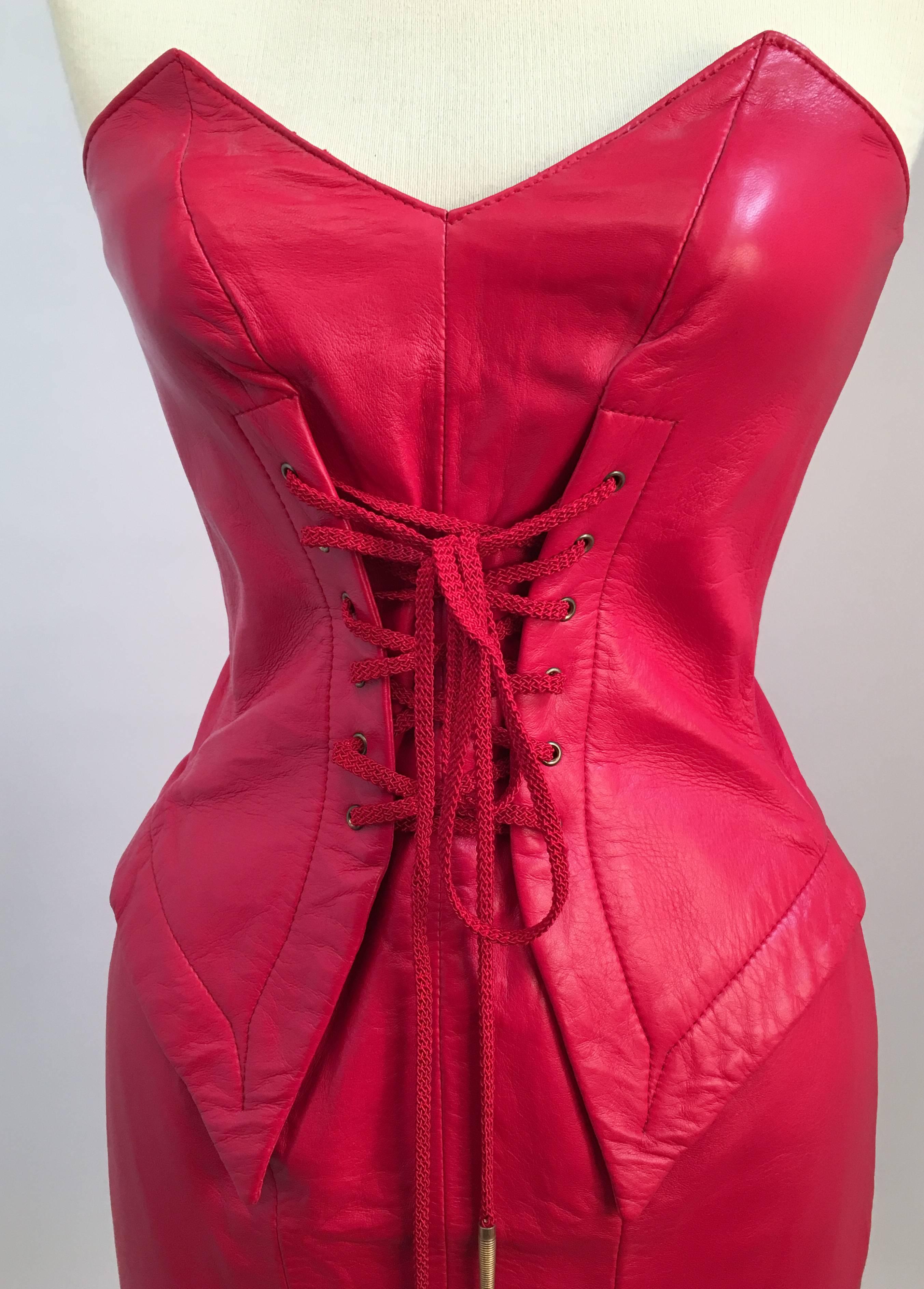 80s Michael Hoban North Beach Leather Bright Red Lace Up Mini Dress. Strapless dress zips up back. Corset laced front with bola tips. 