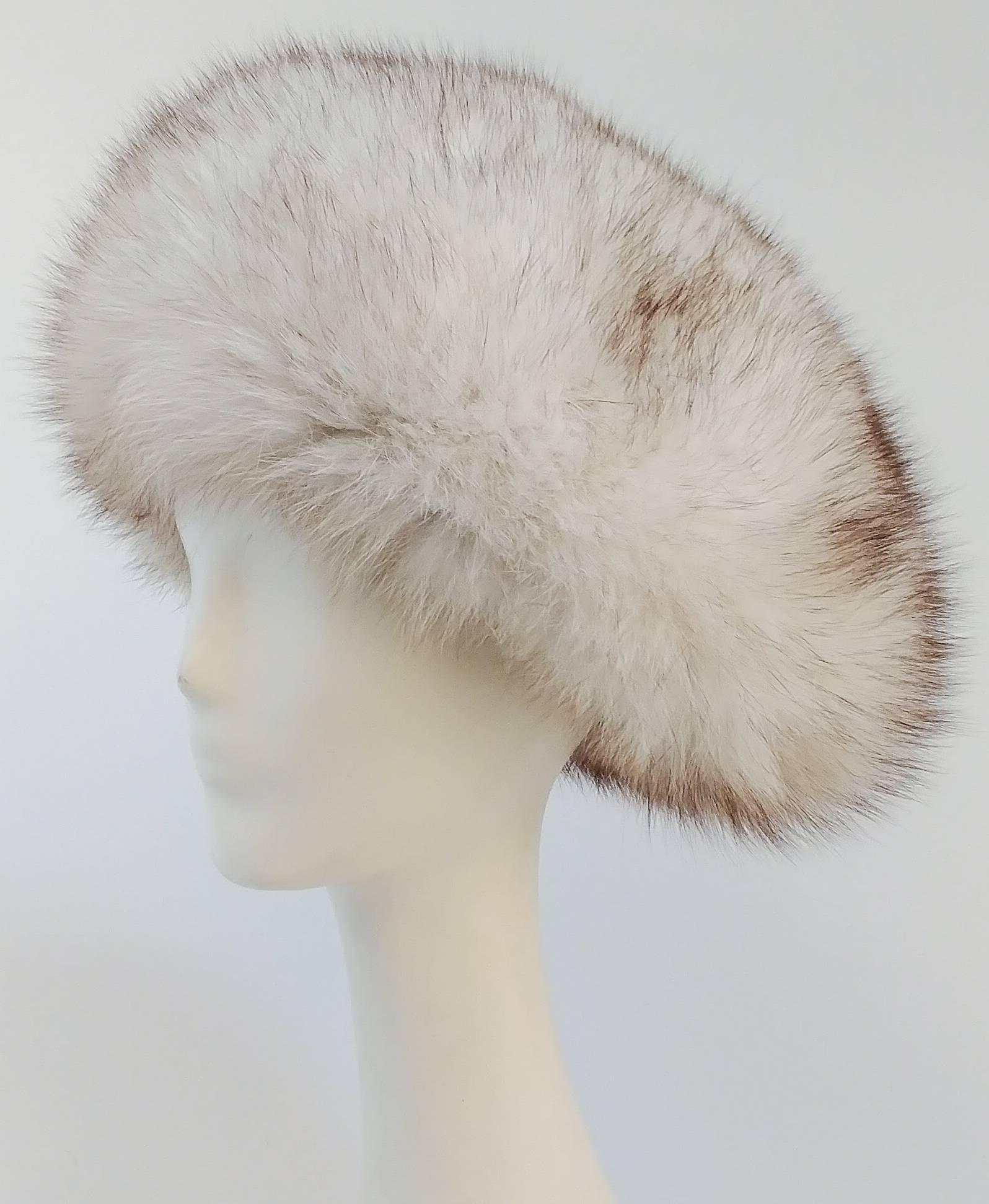 60s Adolfo II White Fox Fur Hat. Sold at Saks Fifth Avenue. Satin lined with grosgrain ribbon. 21.5" circumference. Wear towards the back of your head for true 1960s flair! 