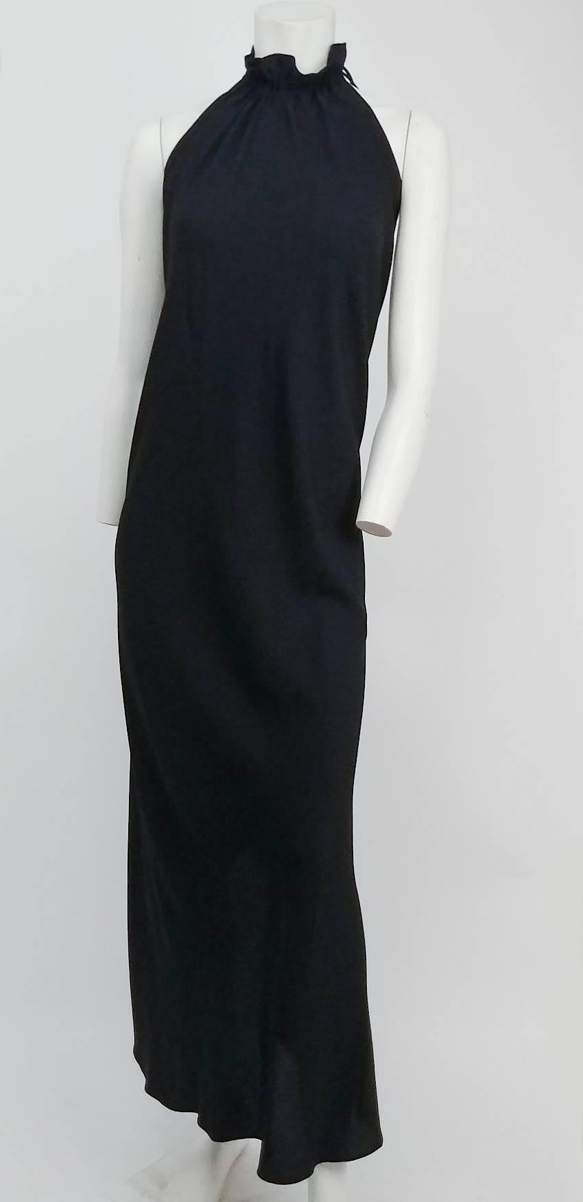 80s Crepe Halter Dress & Jacket Set. Adjustable straps allow for dress to be worn high at neck or lower. Low-cut deep V back. Cape-like jacket has no closures, ties at neck. 