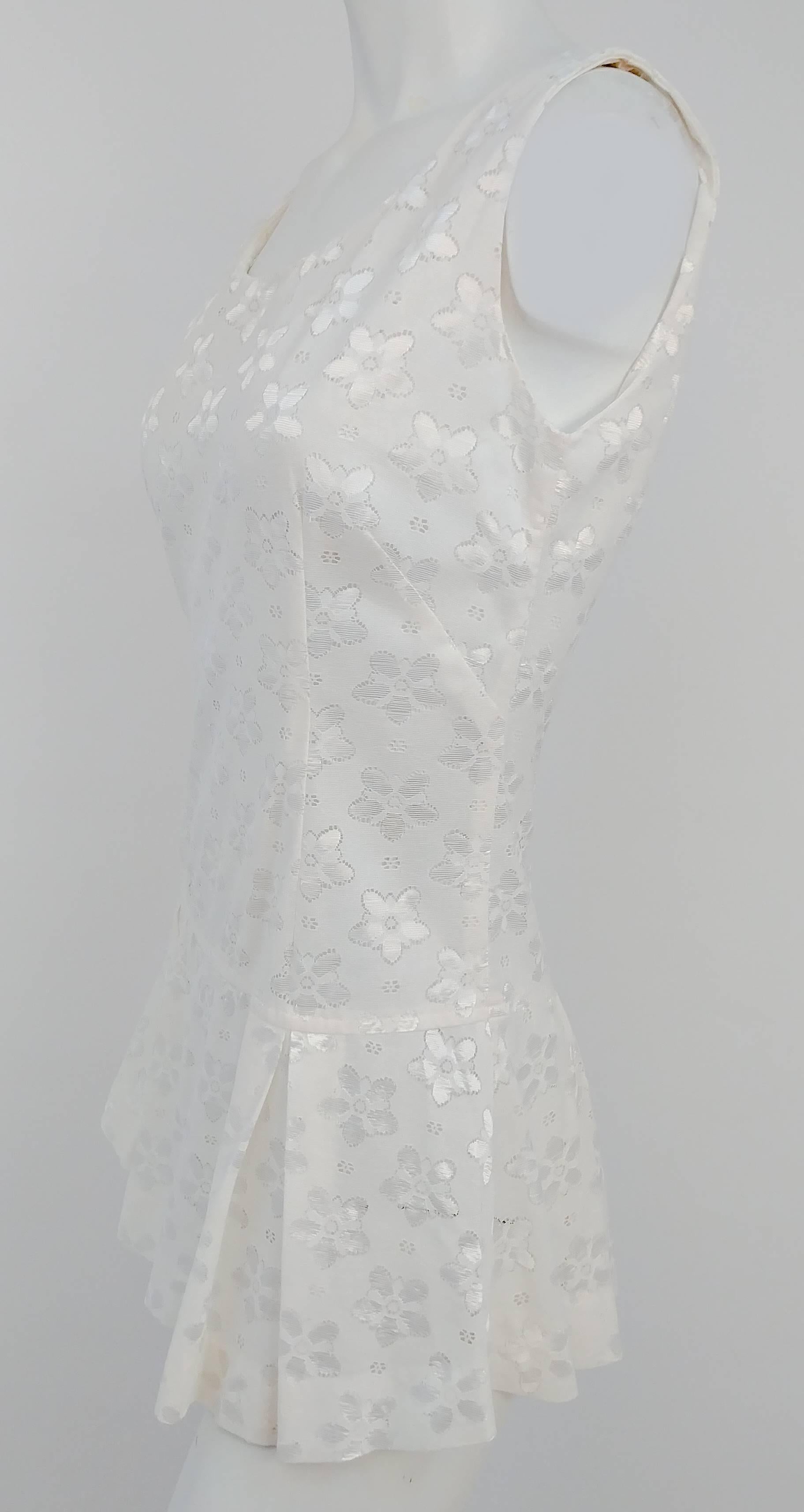 60s White Lace Tennis Dress. Drop waist, pleated skirt. Back zip closure. Unlined. 