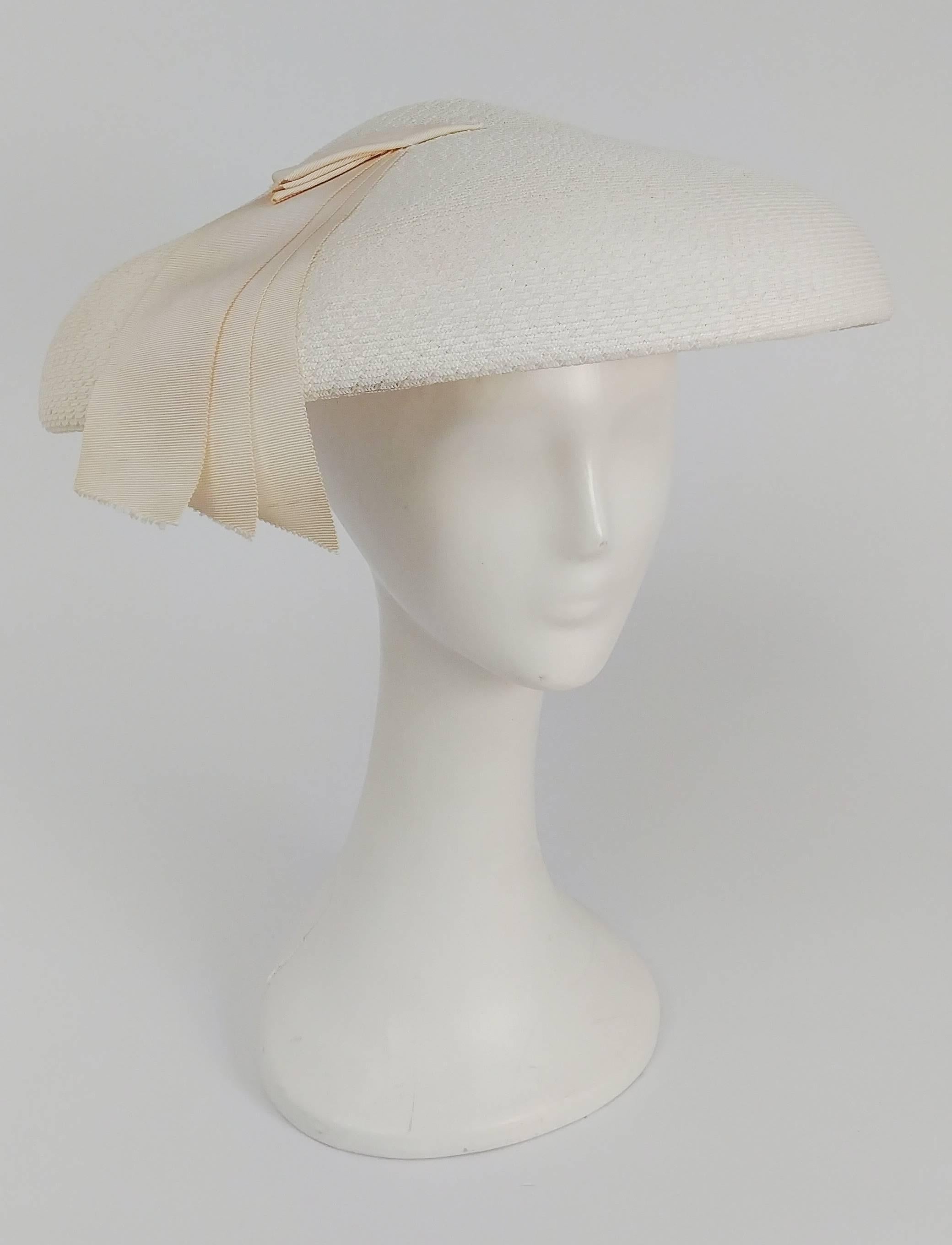 1950s New Look White Saucer Hat. Grosgrain ribbon embellishments. 