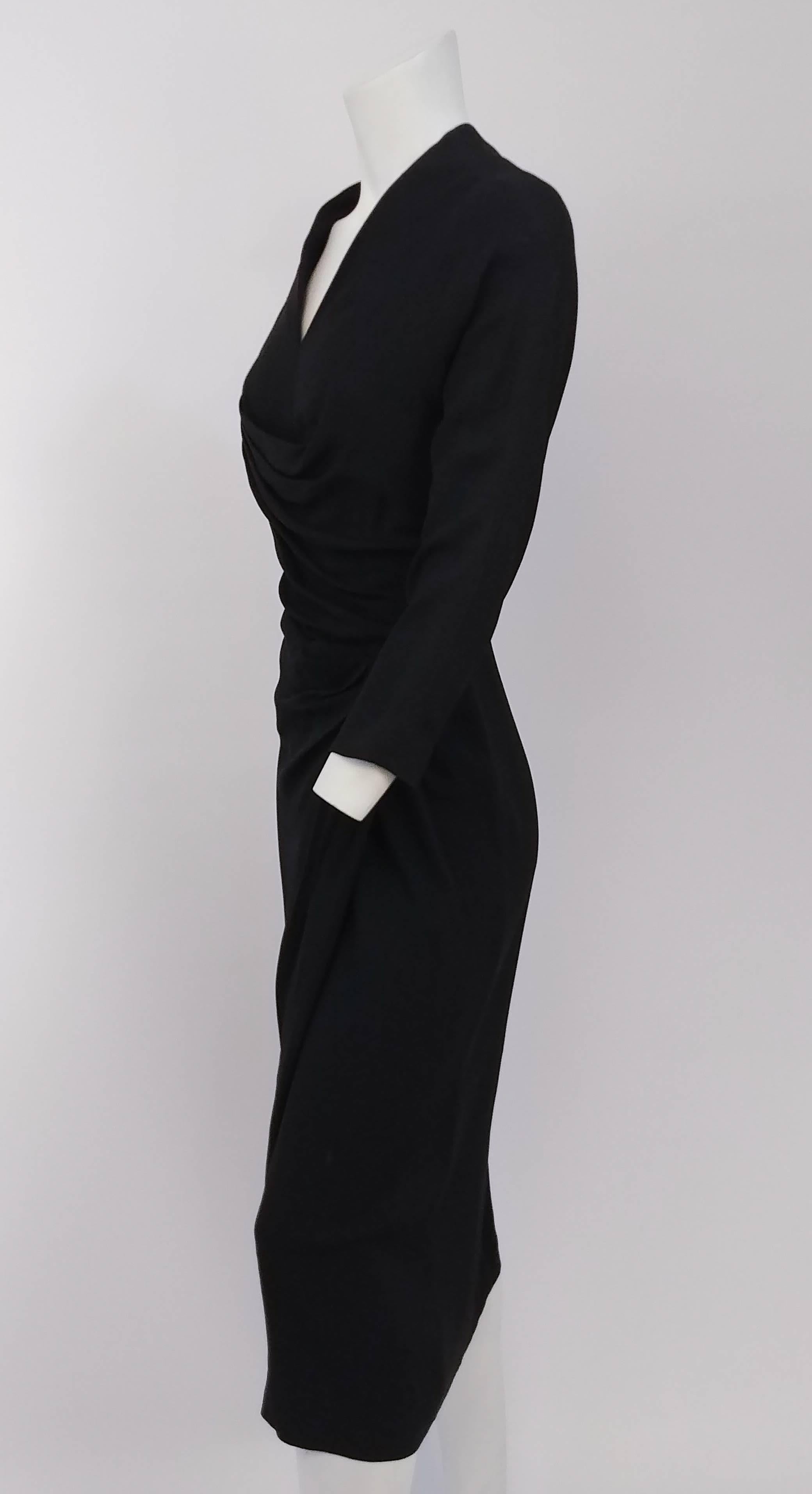 1950s Dorothy O'hara Gathered Black Dress. V-neck dress with asymmetrical draping. Zips up back.