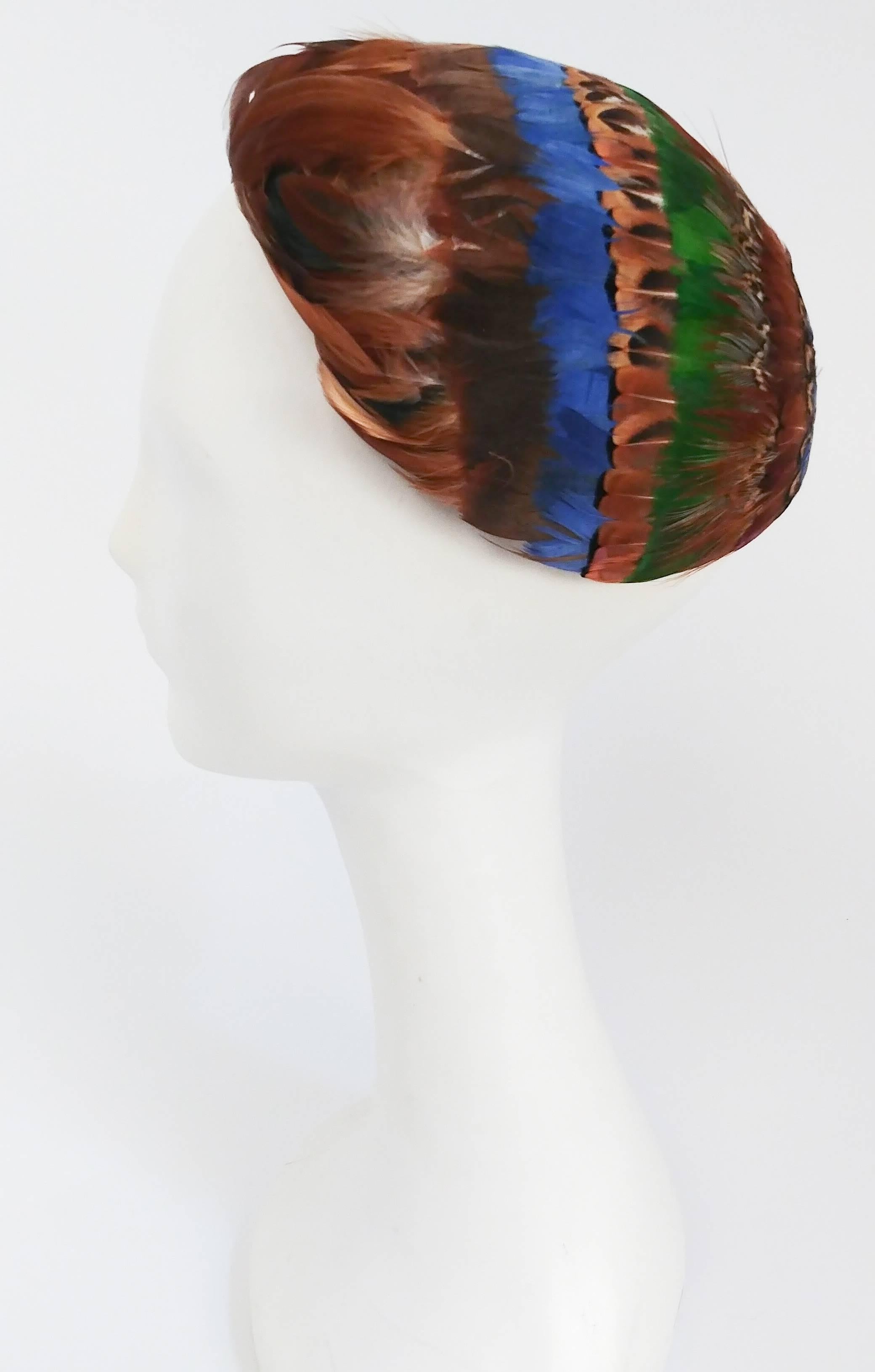 1960s Multicolor Pheasant Feather Hat. Copper, blue, and green feathers on a 1950s hat w/ curled feather front.