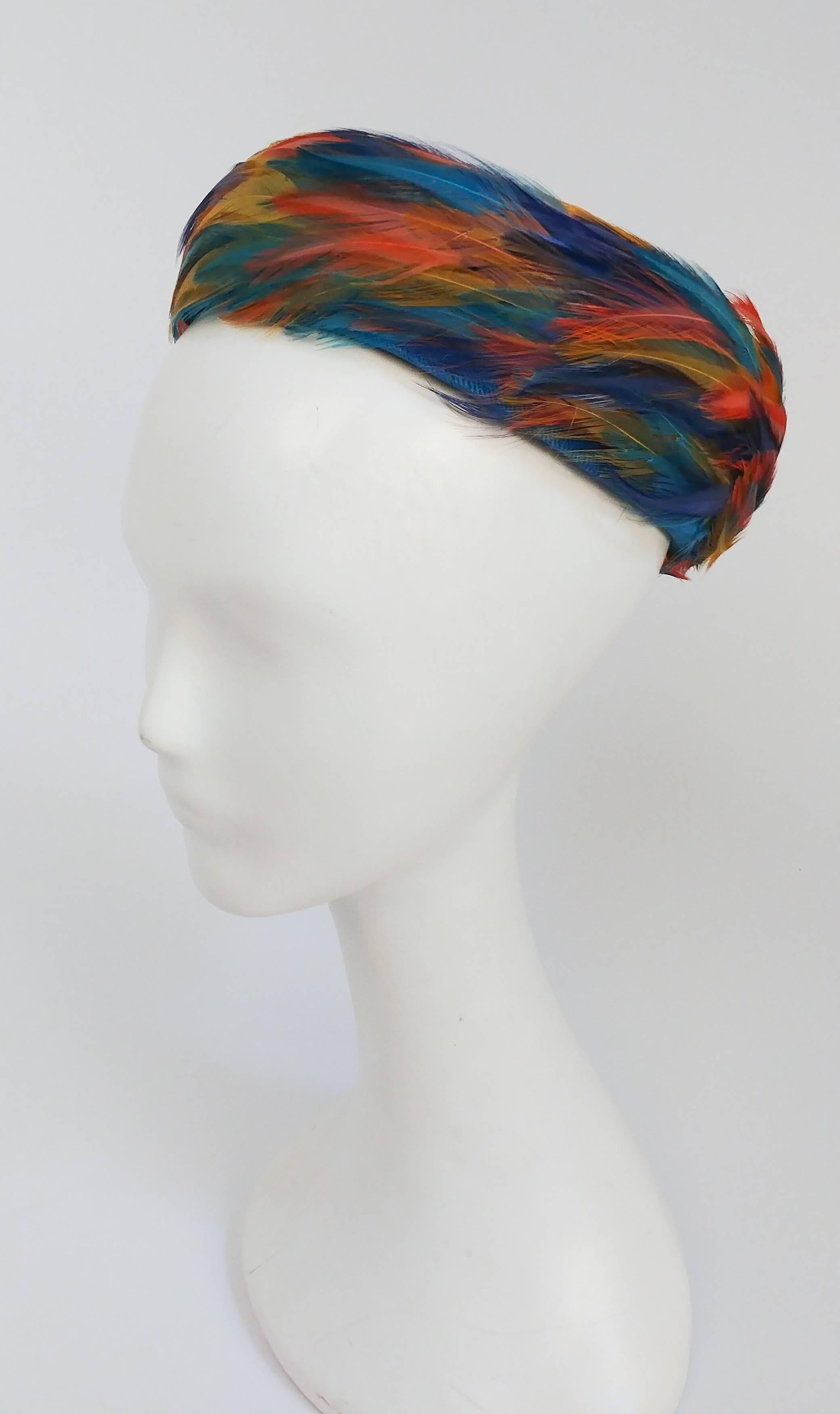 1960s Bright Rainbow Feather Hat. Blue velvet base and mesh top.