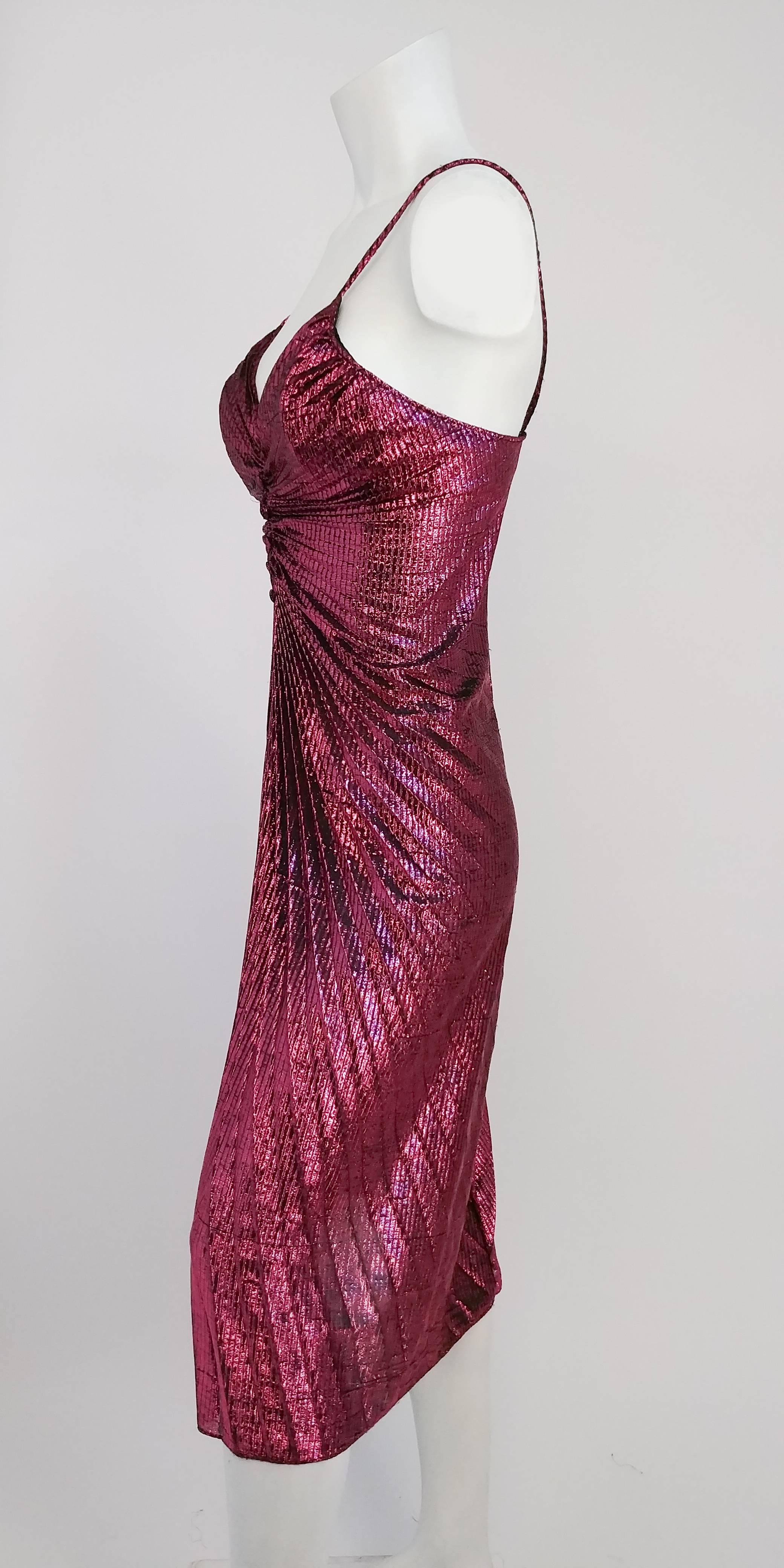 1960s Hot Pink Metallic Pleated Disco Dress. Heat set accordion pleated dress with covered buttons sewn decoratively down center front. Has built in bandeau for support. 