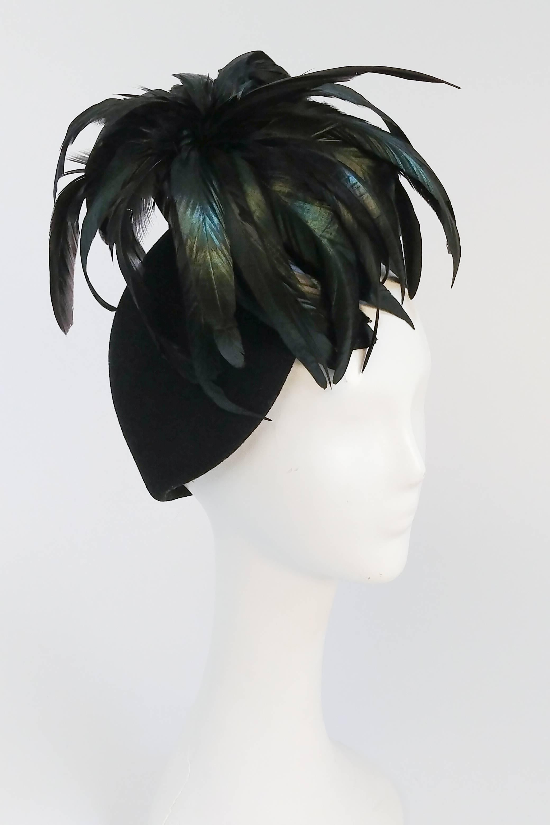 1980s Mr. John Rooster Feather Hat. A spray of feathers articulate this elegant black wool hat.