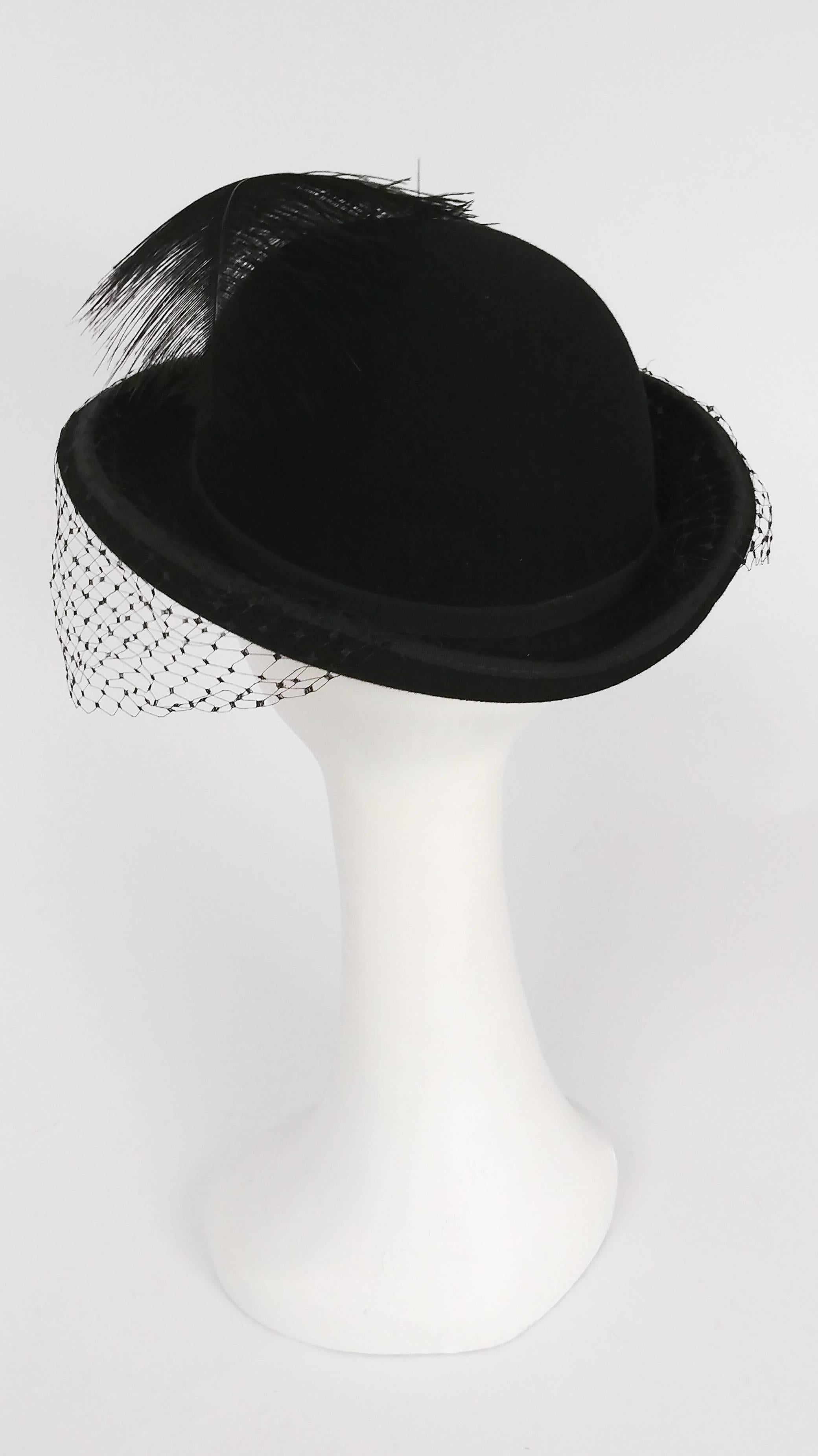 bowler hat with feather