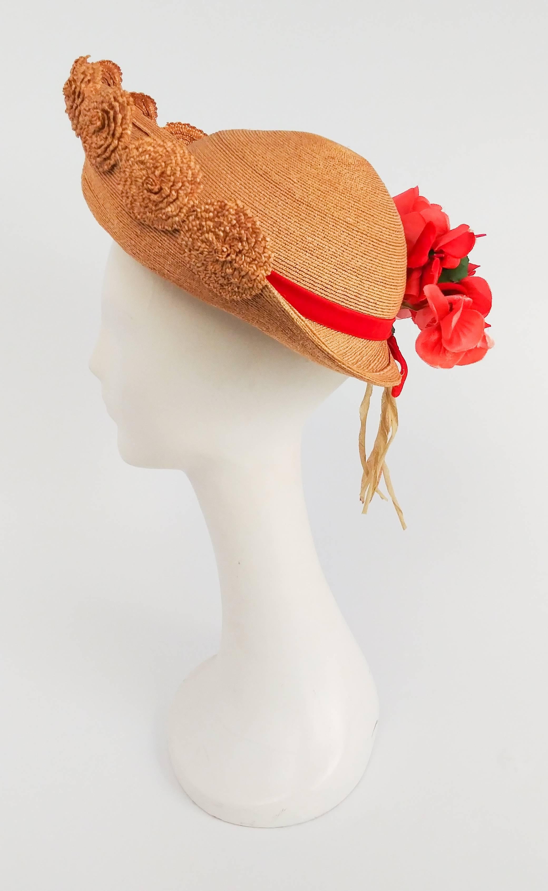 1940s Straw Hat w/ Red Ribbon. Red flowers embellish back. Elastic holds hat to back of head.