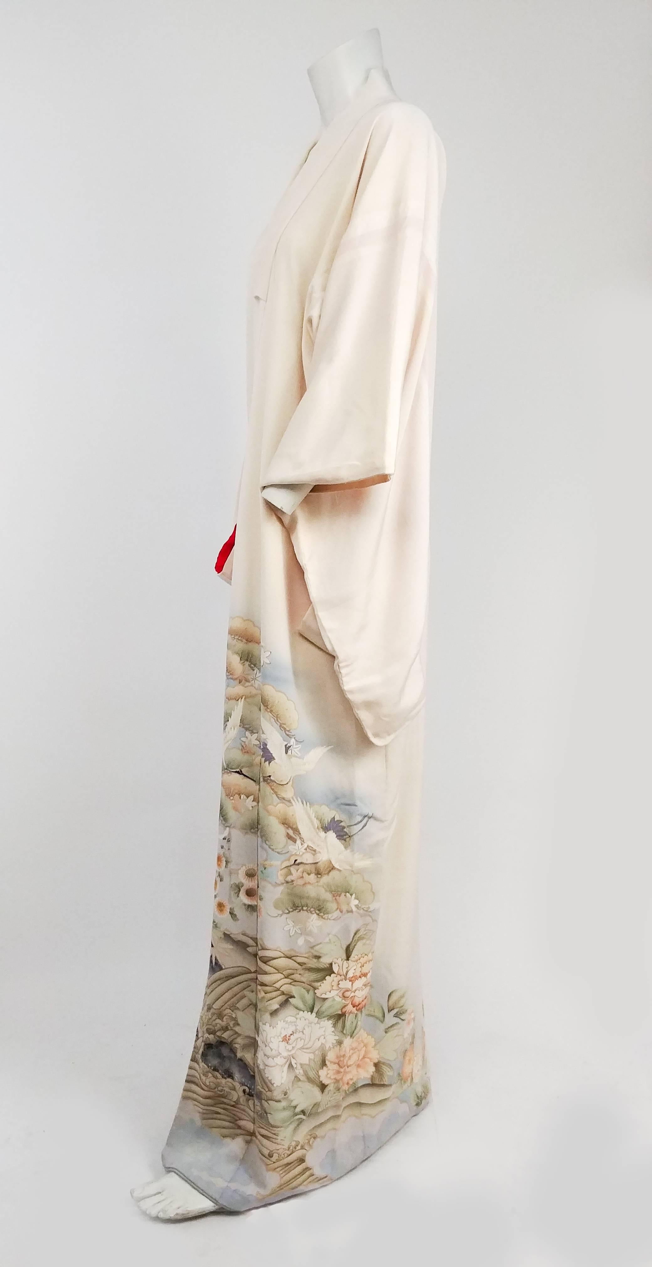 Cranes Over Hills & Waves White Silk Kimono. Beautiful painted scene further embellished with metallic paint detail and selective embroidery for more dimension. Fully lined, sleeves lined in red. 