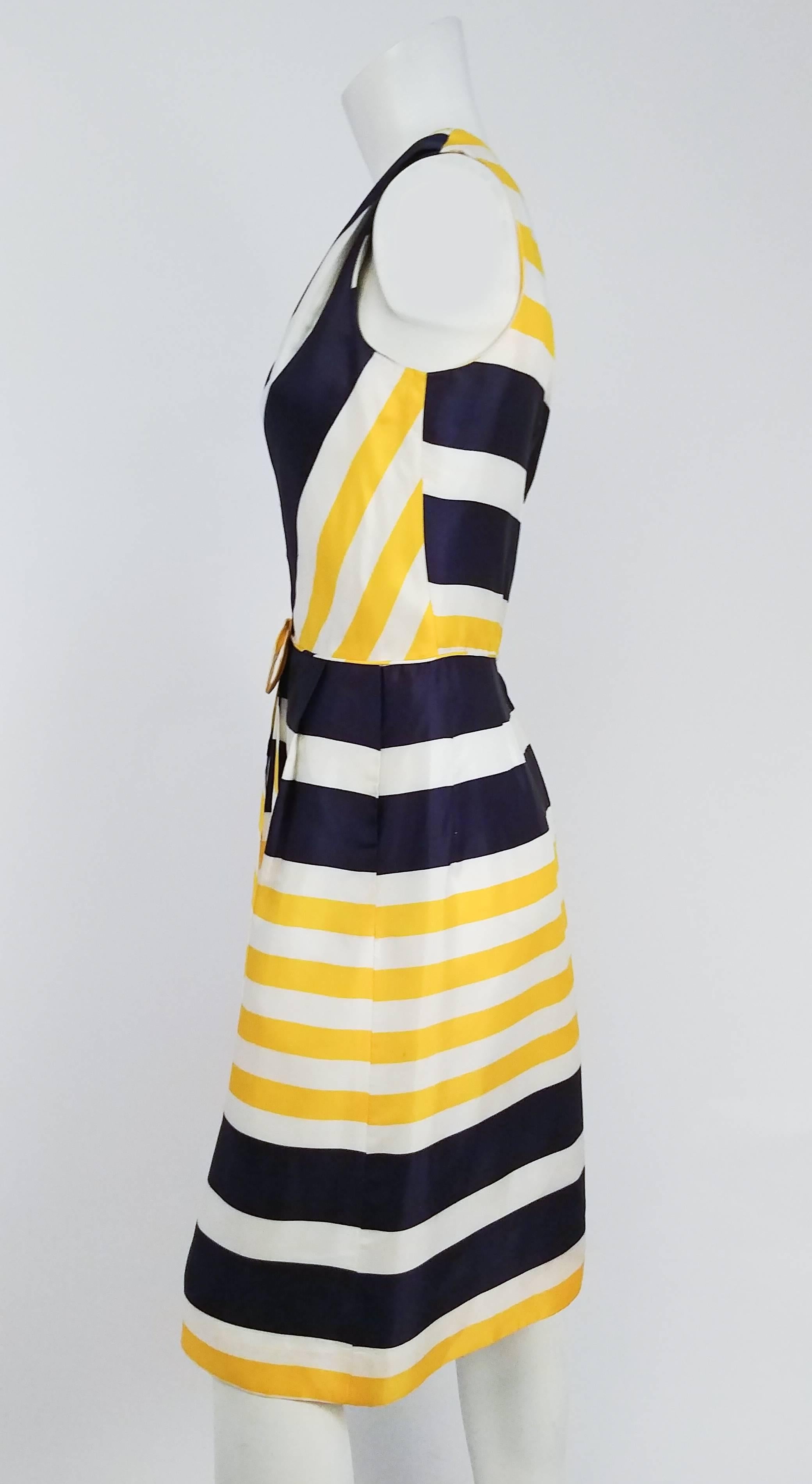 1960s Blue & Yellow Striped Pleated Dress. Pleated skirt w/ hidden pockets. Chevron V neck bodice. Unlined.