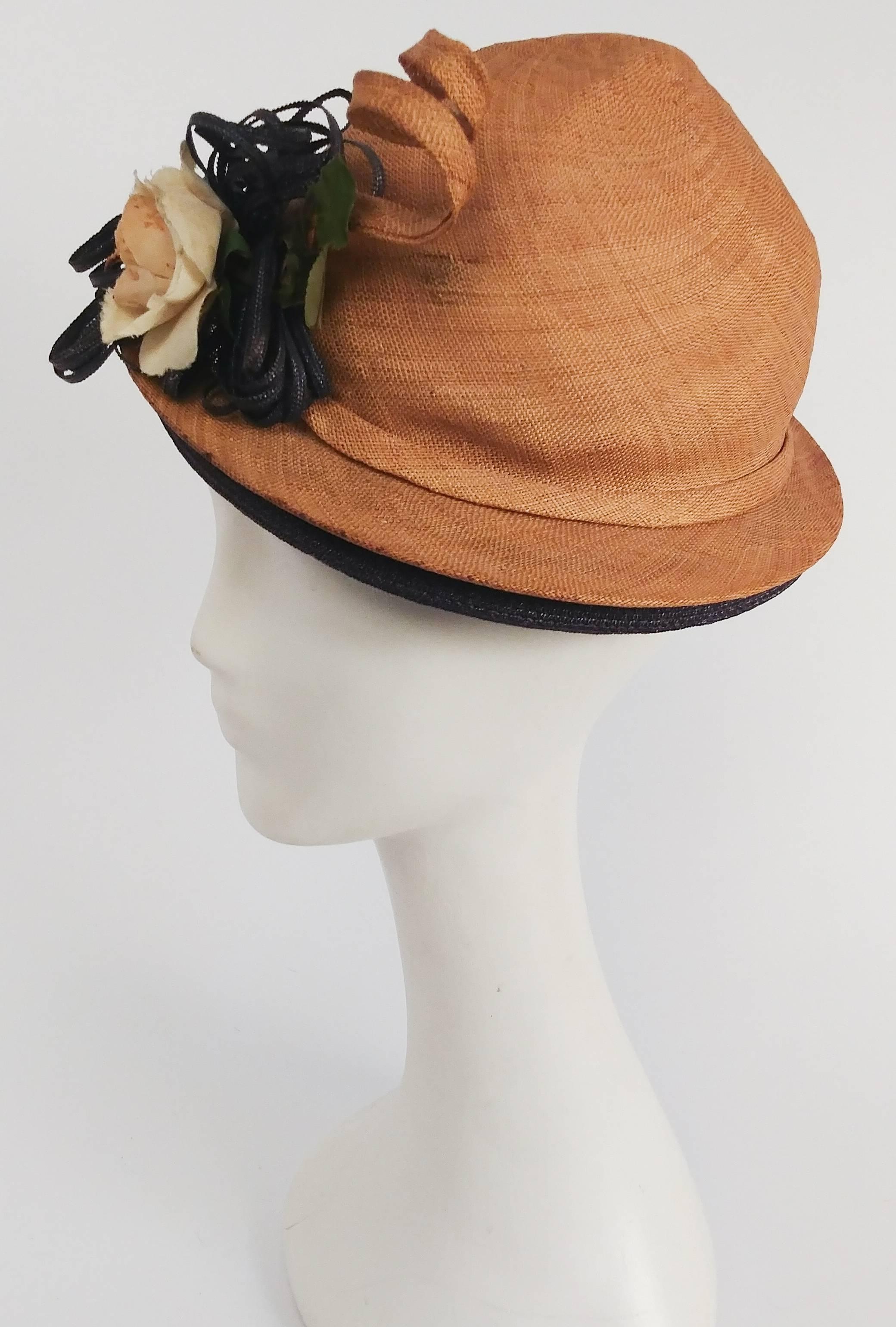 1930s Whimsical Corkscrew Straw Hat. Straw corkscrew springs up from the brim of this hat, which is further embellished with a rose. Wear tilted towards the front of the head for true 1930s flair. 