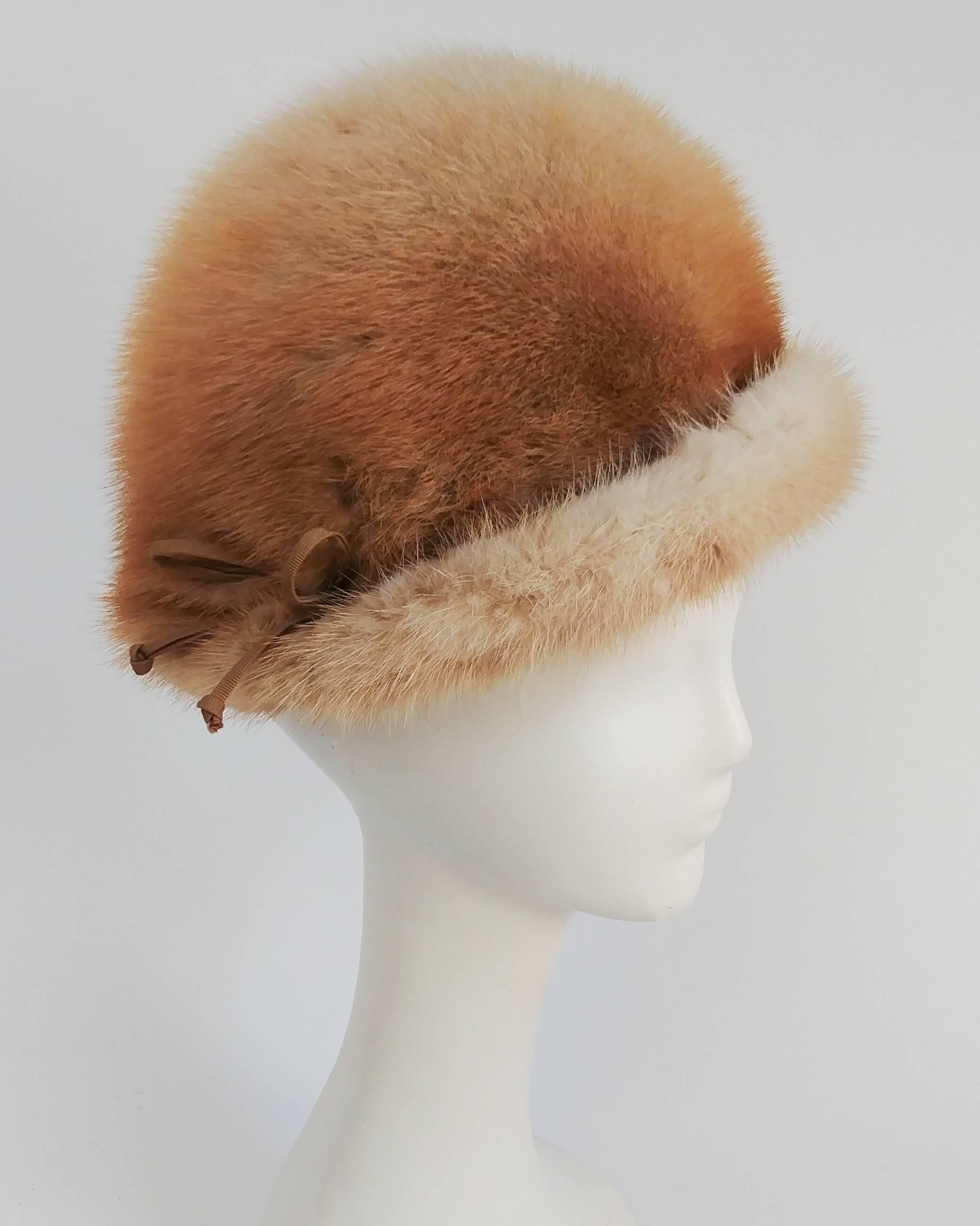 1960s Blonde Mink Cloche Hat. Decorative ribbon embellishes the brim. 