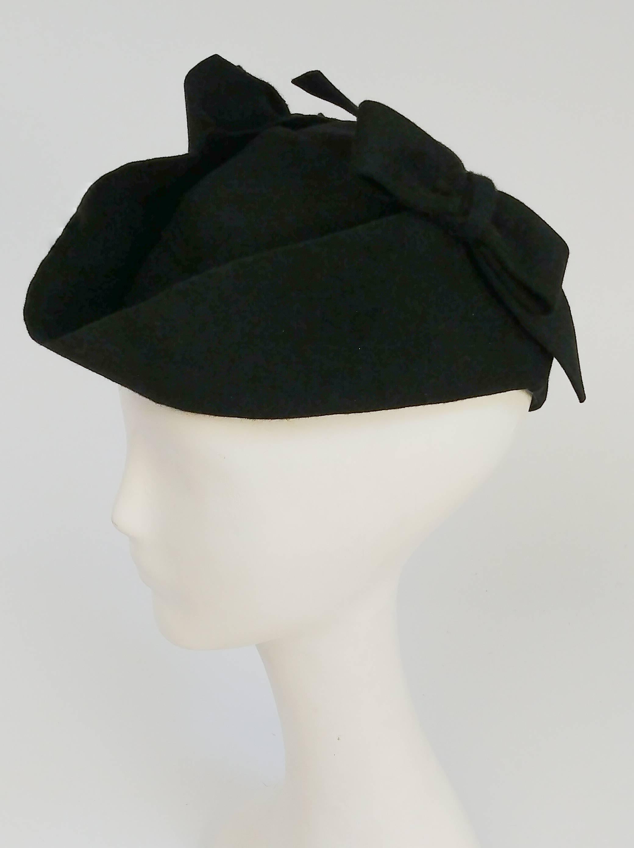1940s Felt Mini Tricorn w/ Bows. Elastic holds hat to head, wear tilted forward for true 40s flair. 