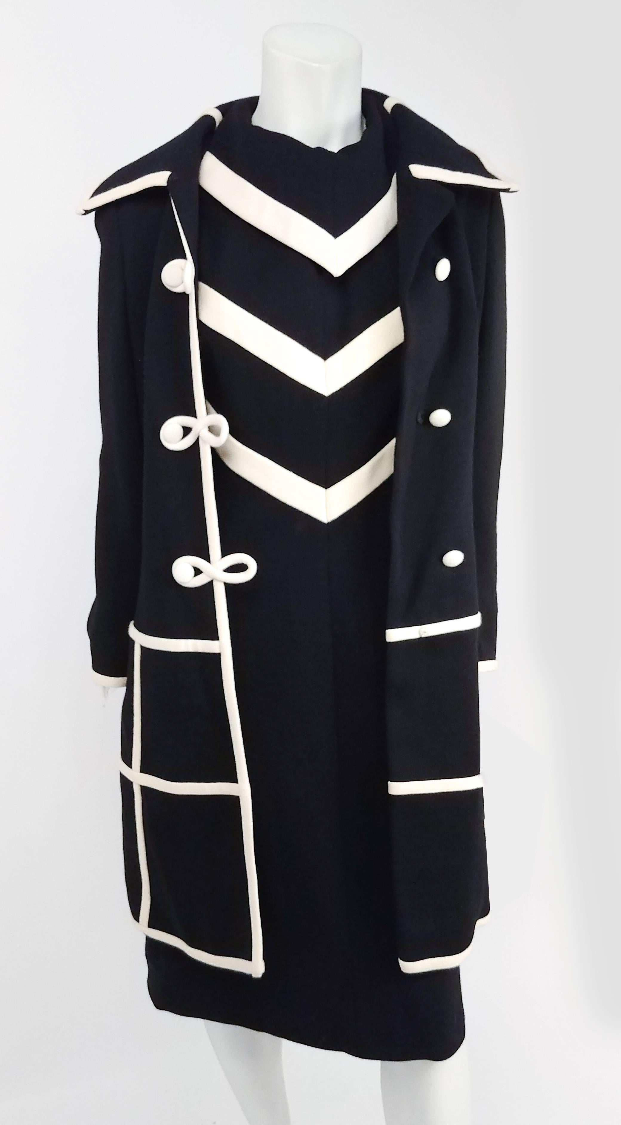 1960s Lilli Ann Black/White Two Piece Knit Dress Set. White contrast cage pattern on coat, matches white trim on collar and sleeves. Dress has front chevrons and kerchief collar that can flip up over the coat collar or tuck in. Zips up back. 