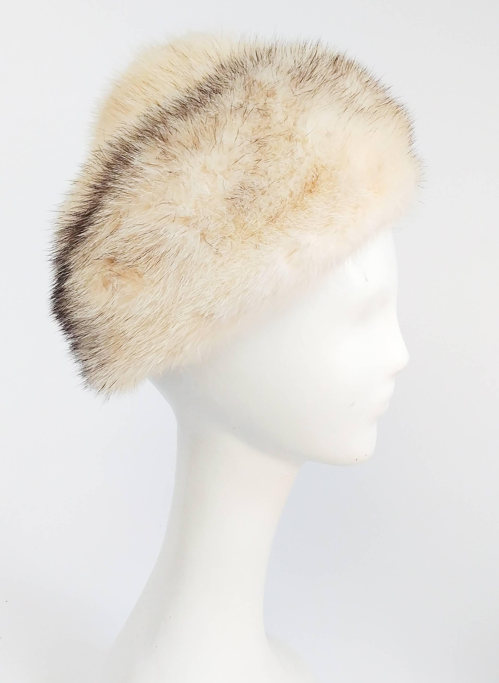 1960s Cream Cone Mink Hat. Worn perched towards back of head. Measures 17