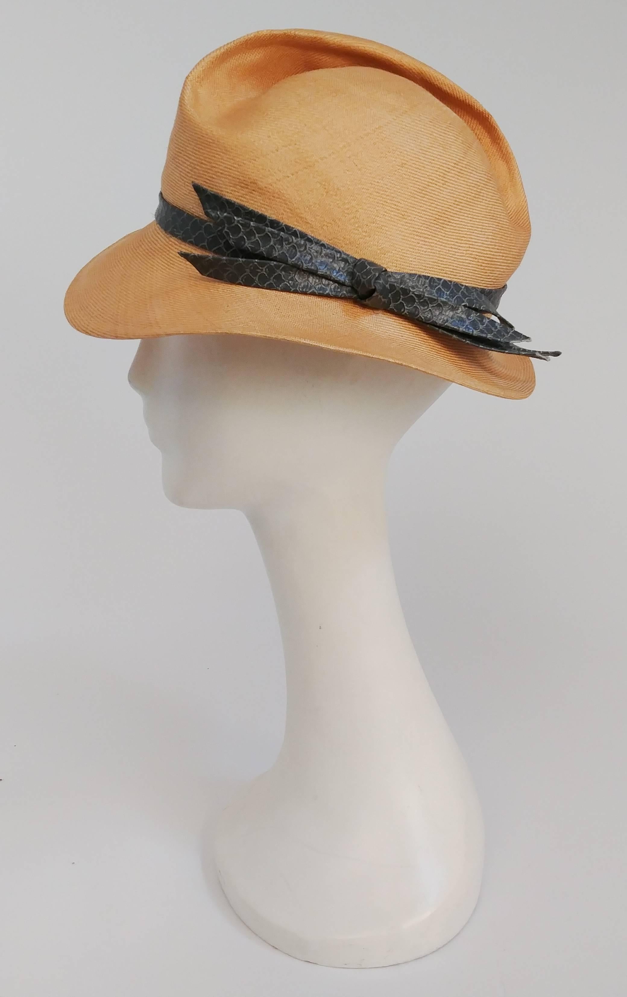 1980s Adolfo Straw Sculptural Panama w/ Faux Snake Band. Hat has been shaped and is held in place with ribbon inside the hat to keep its sculptural shape. Hat measures 21