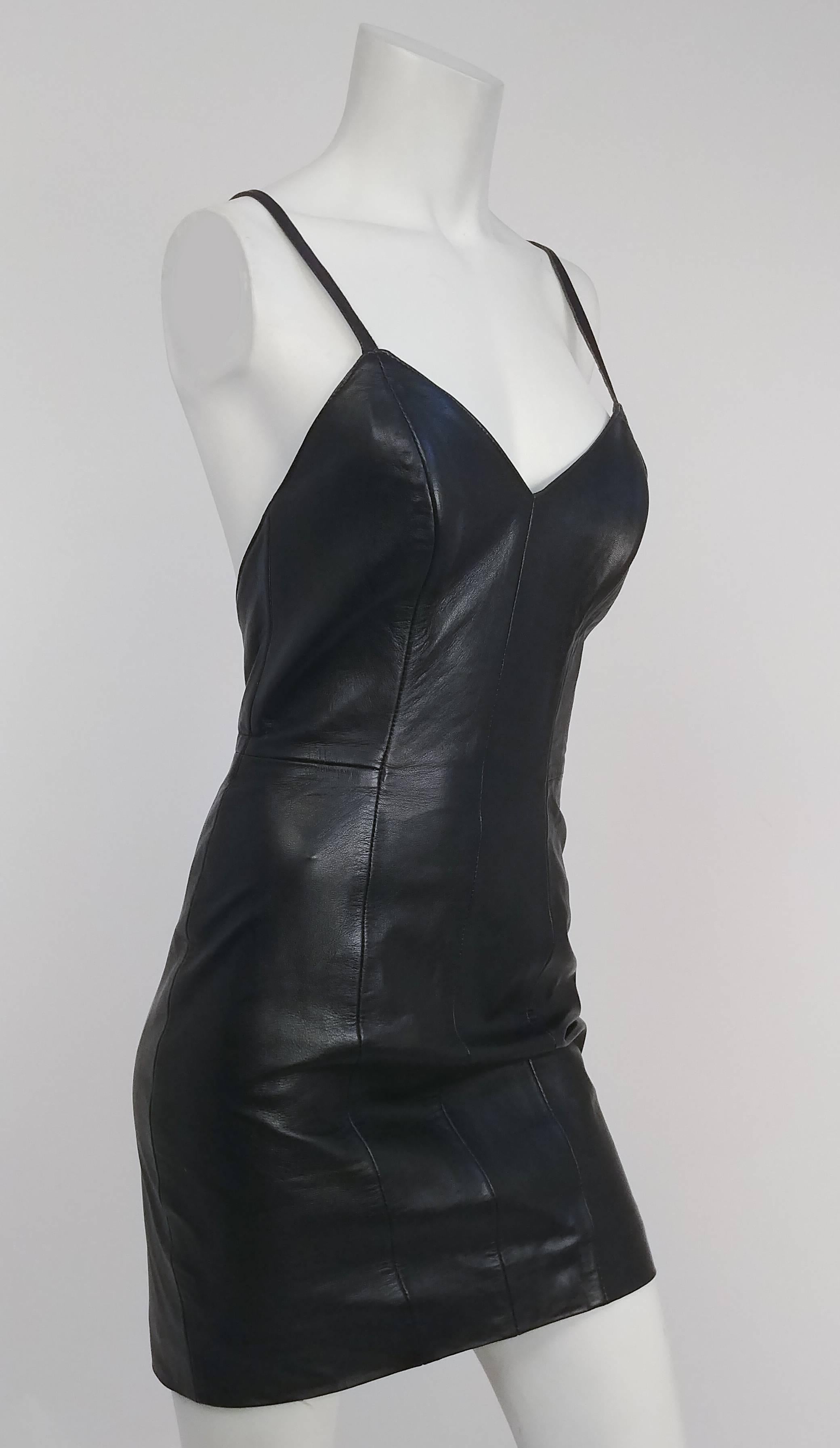 Micheal Hoban North Beach Leather Black Mini Dress. Spaghetti straps cross over sexy low back. Buttery soft leather. Zips up back. 