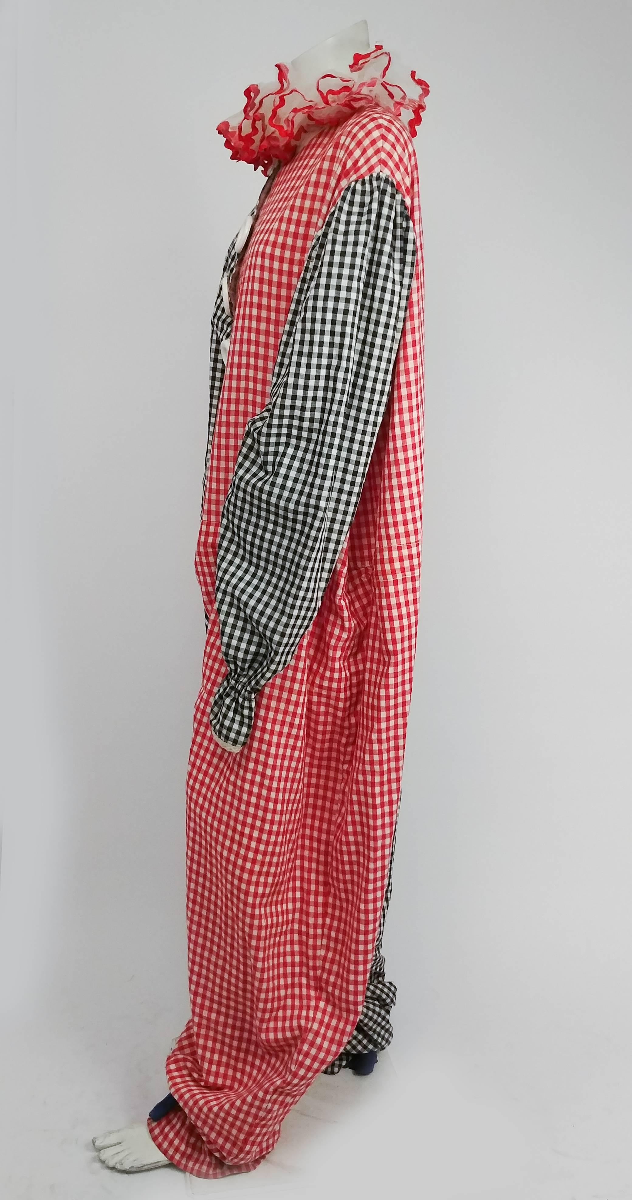 1950s Vintage Bicolour Gingham Clown Costume. Large plastic buttons over velcro closure. Mesh ruff with rickrack trim ties on. Large plastic shoes are meant to be worn over normal shoes. 